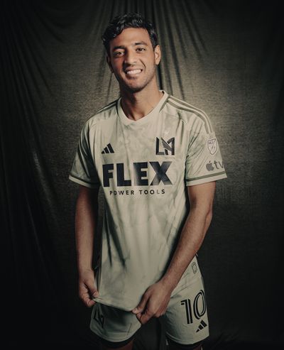 LAFC striker Carlos Vela shows of the team's new “smokescreen” away kit