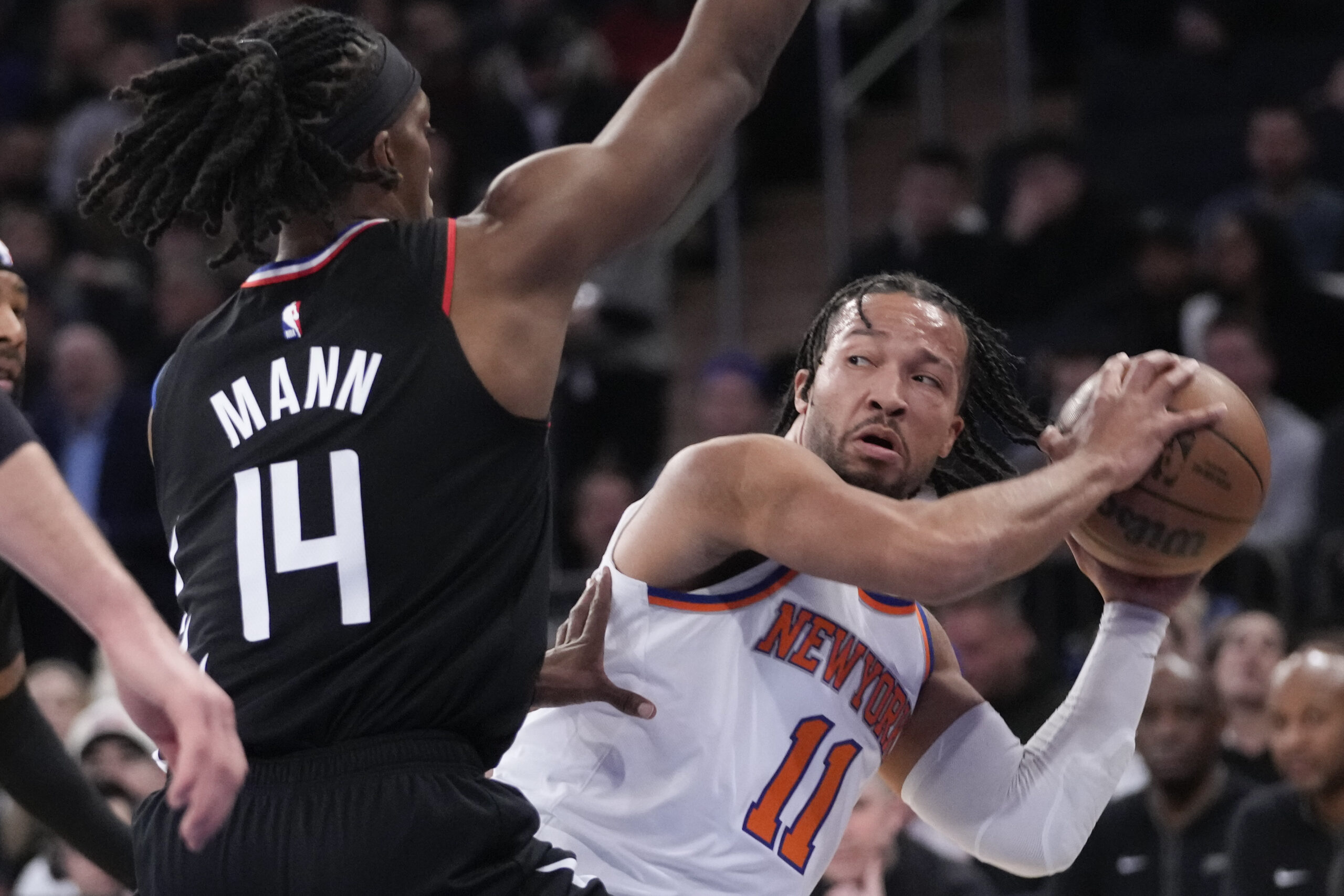 New York Knicks guard Jalen Brunson (11) looks to move...