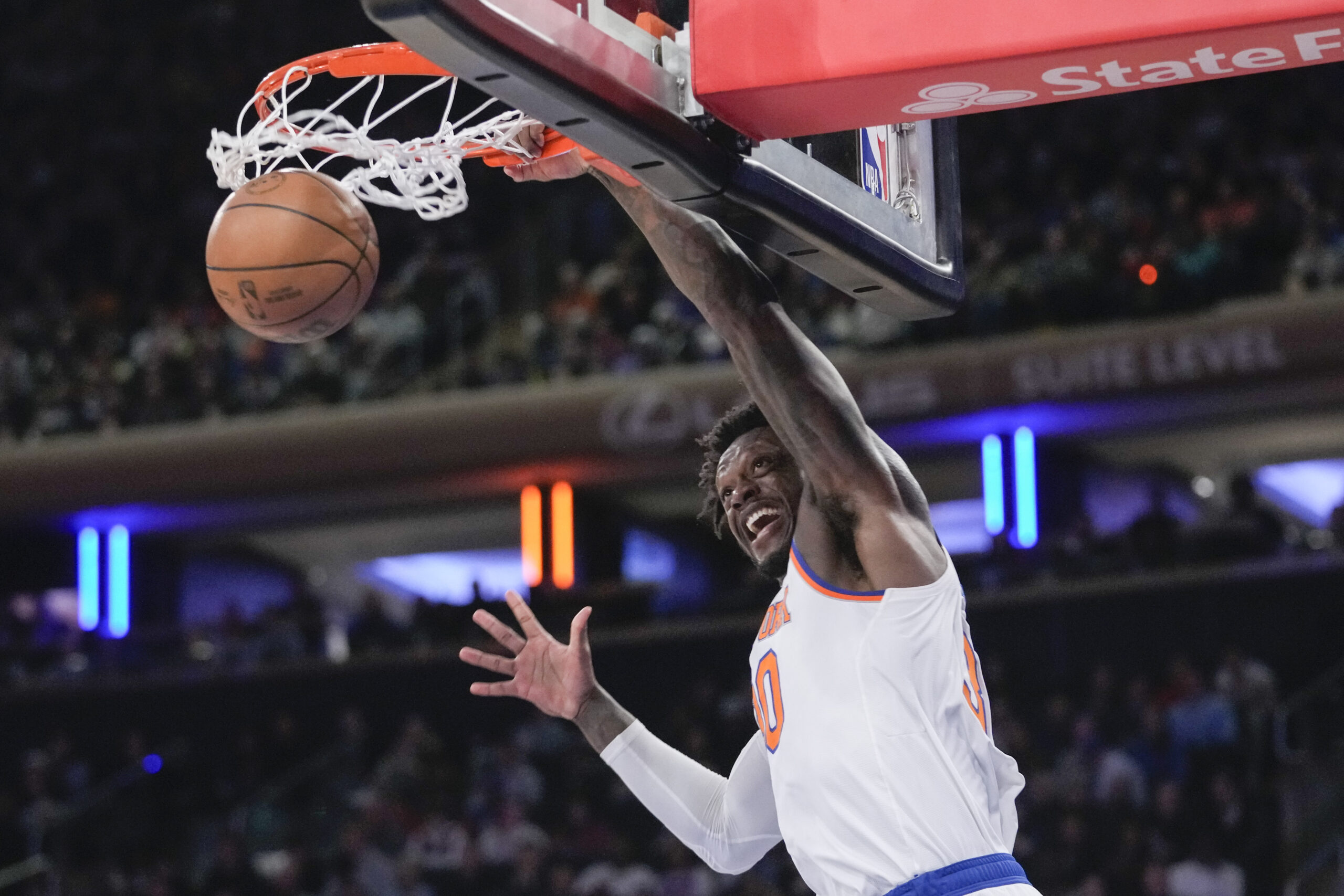 New York Knicks forward Julius Randle dunks in the first...