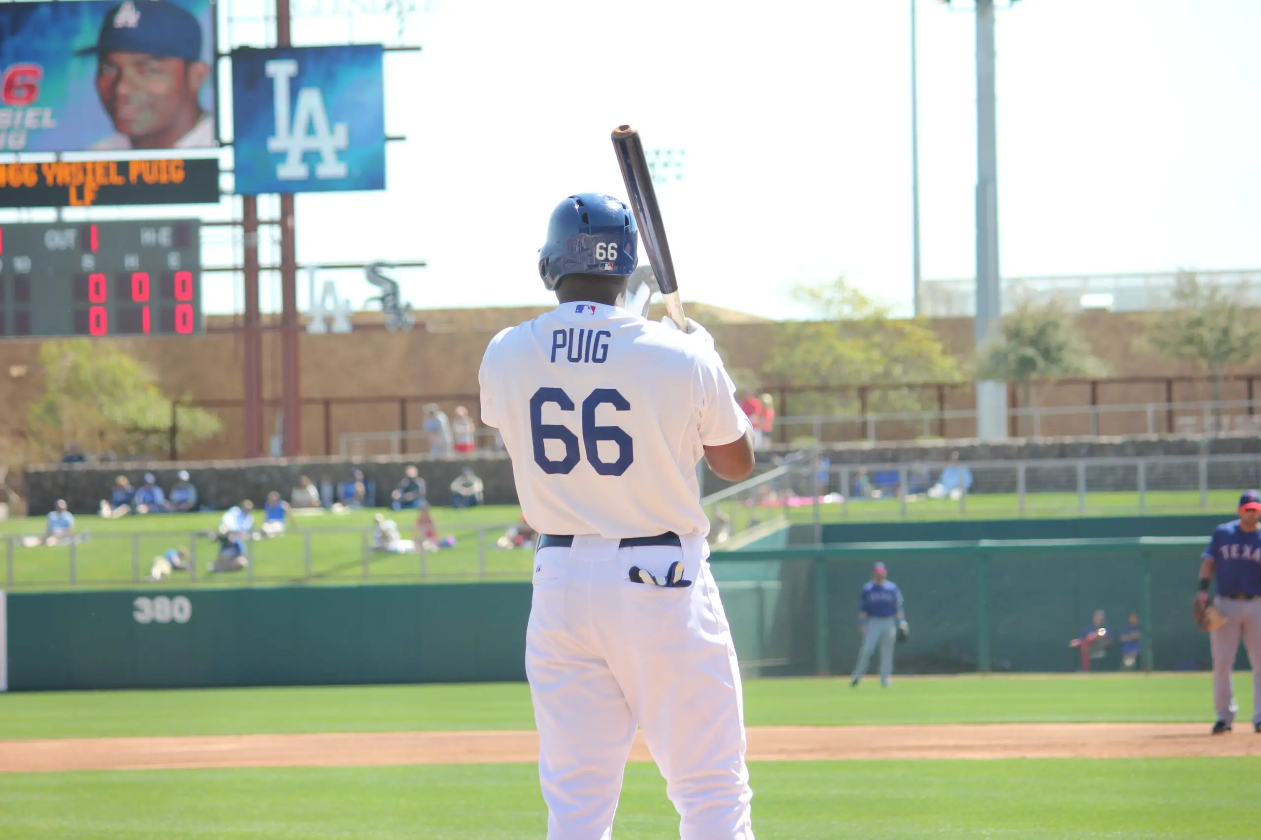 Yasiel Puig stands in the on-deck circle at Camelback Ranch in a game between the Dodgers and the Rangers. March 7, 2013.