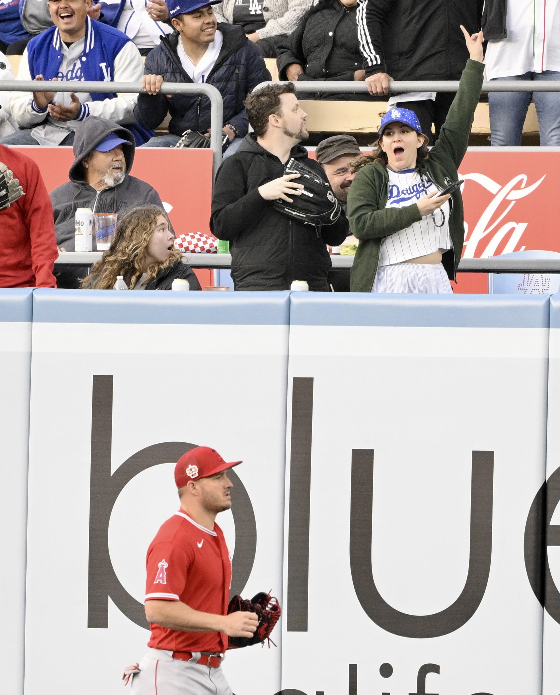 Fans react after Chris Taylor (not pictured) of the Los...