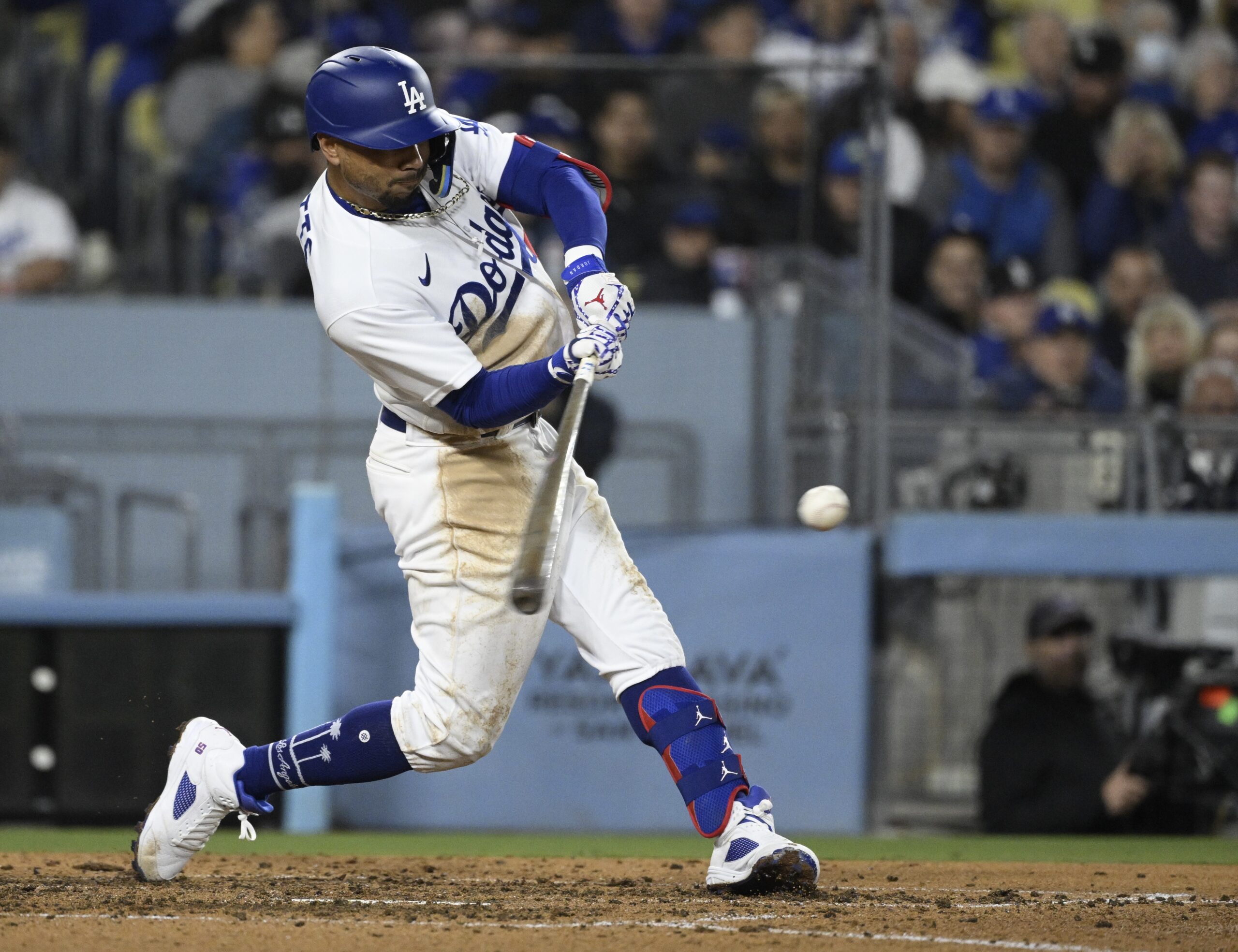 The Dodgers’ Mookie Betts hits a solo home run during...