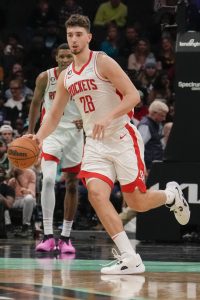 Apr 7, 2023; Charlotte, North Carolina, USA; Houston Rockets center Alperen Sengun (28) brings the ball up court against the Charlotte Hornets during the second quarter at the Spectrum Center. Mandatory Credit: Jim Dedmon-USA TODAY Sports