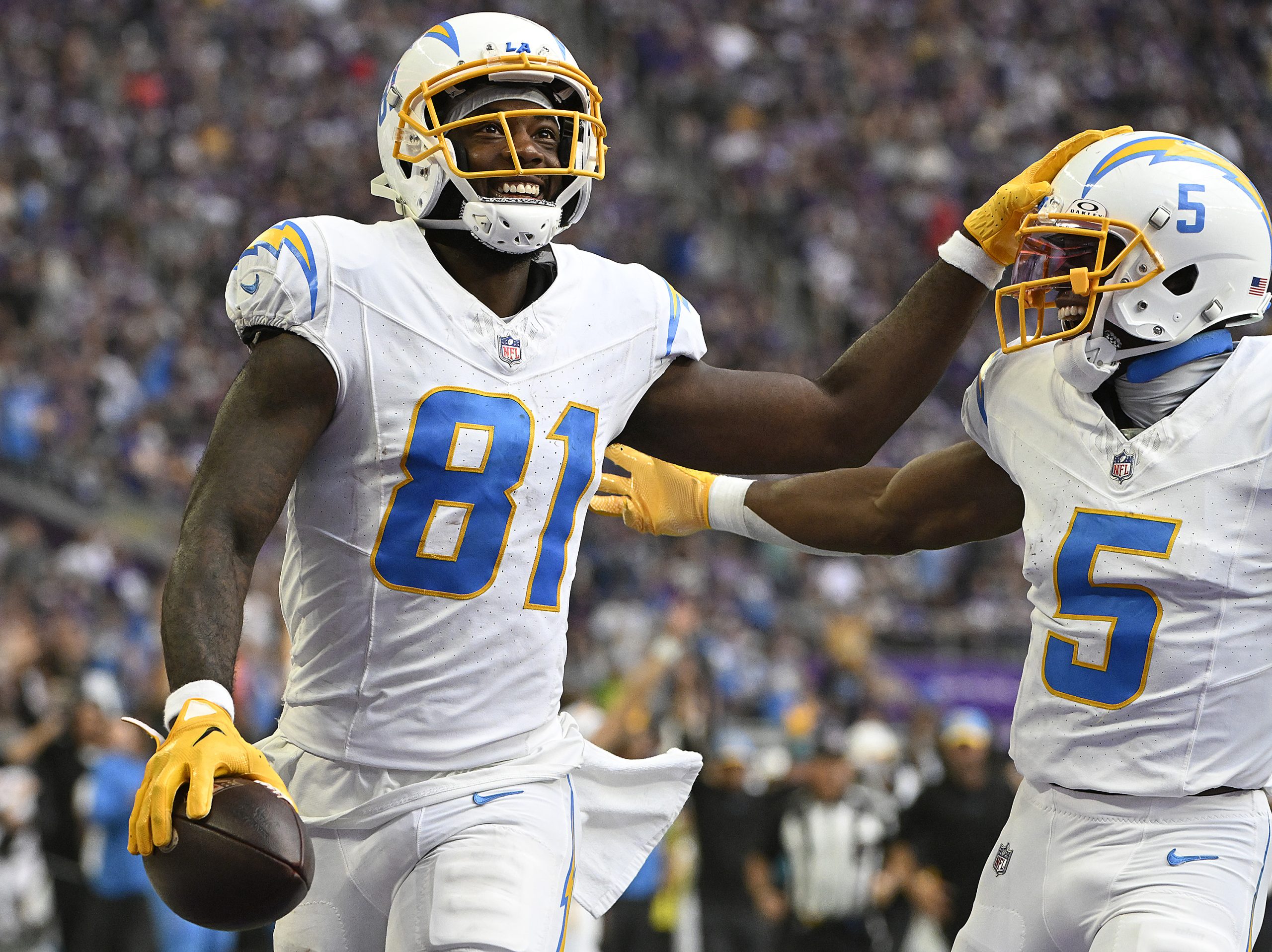 Mike Williams of the Los Angeles Chargers and Joshua Palmer...