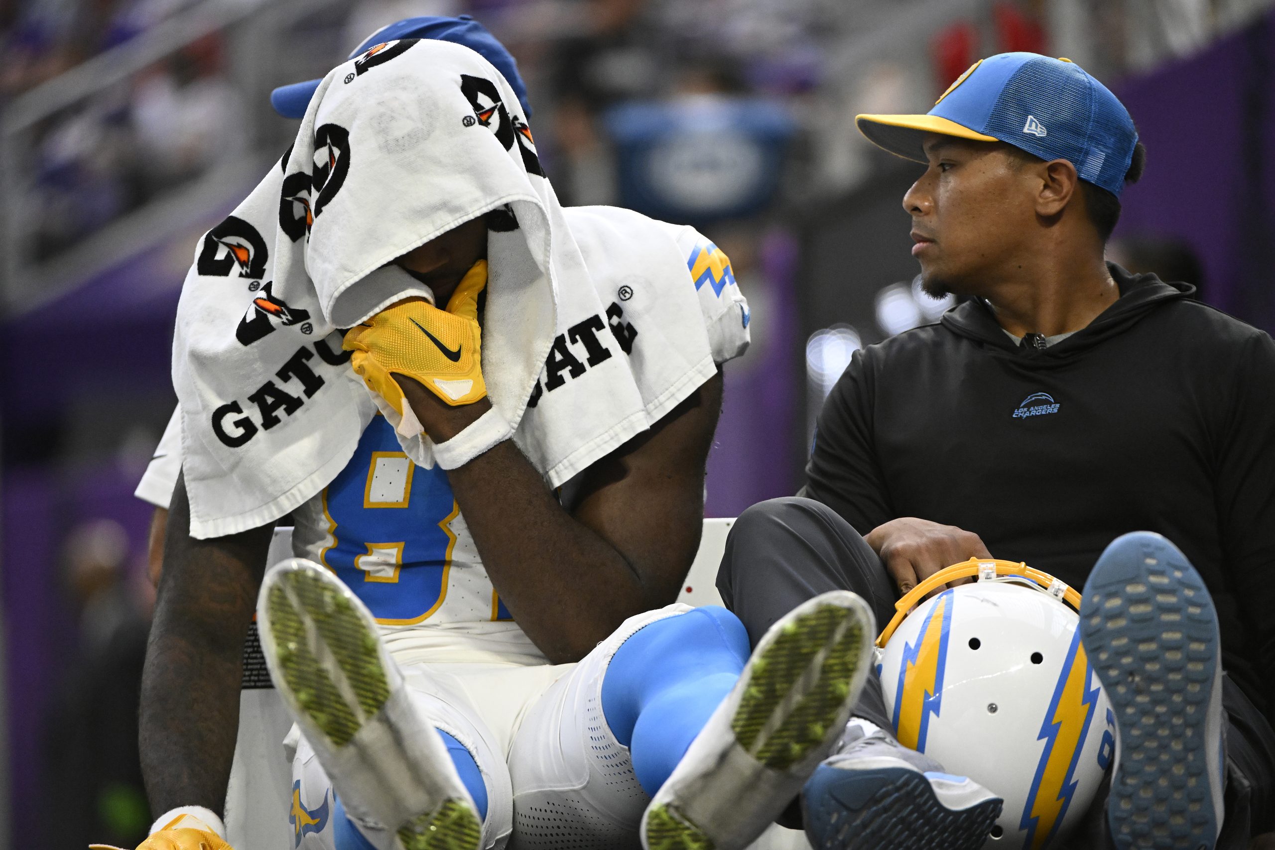 Mike Williams of the Los Angeles Chargers is carted off...