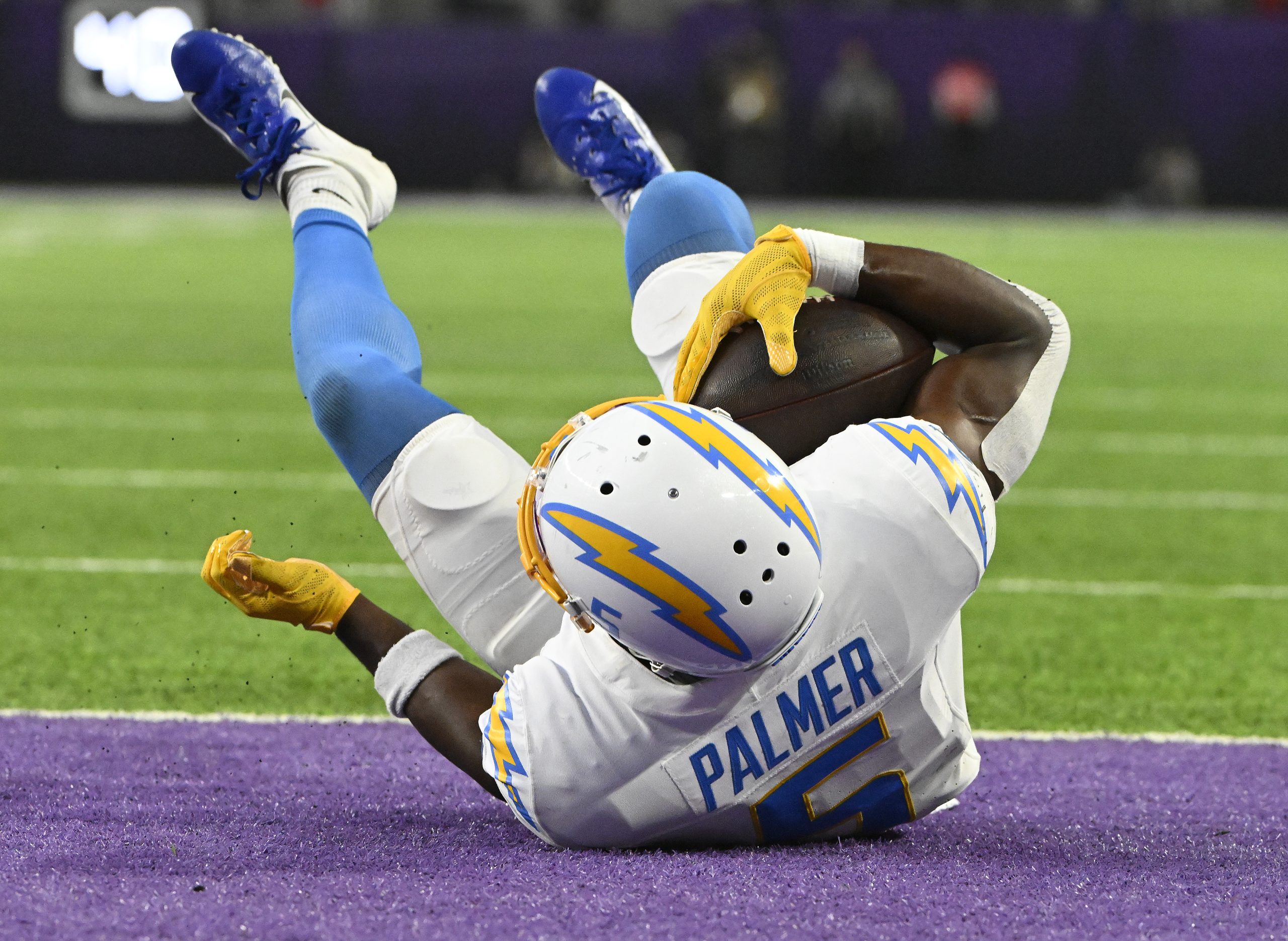 Joshua Palmer of the Los Angeles Chargers catches a receiving...