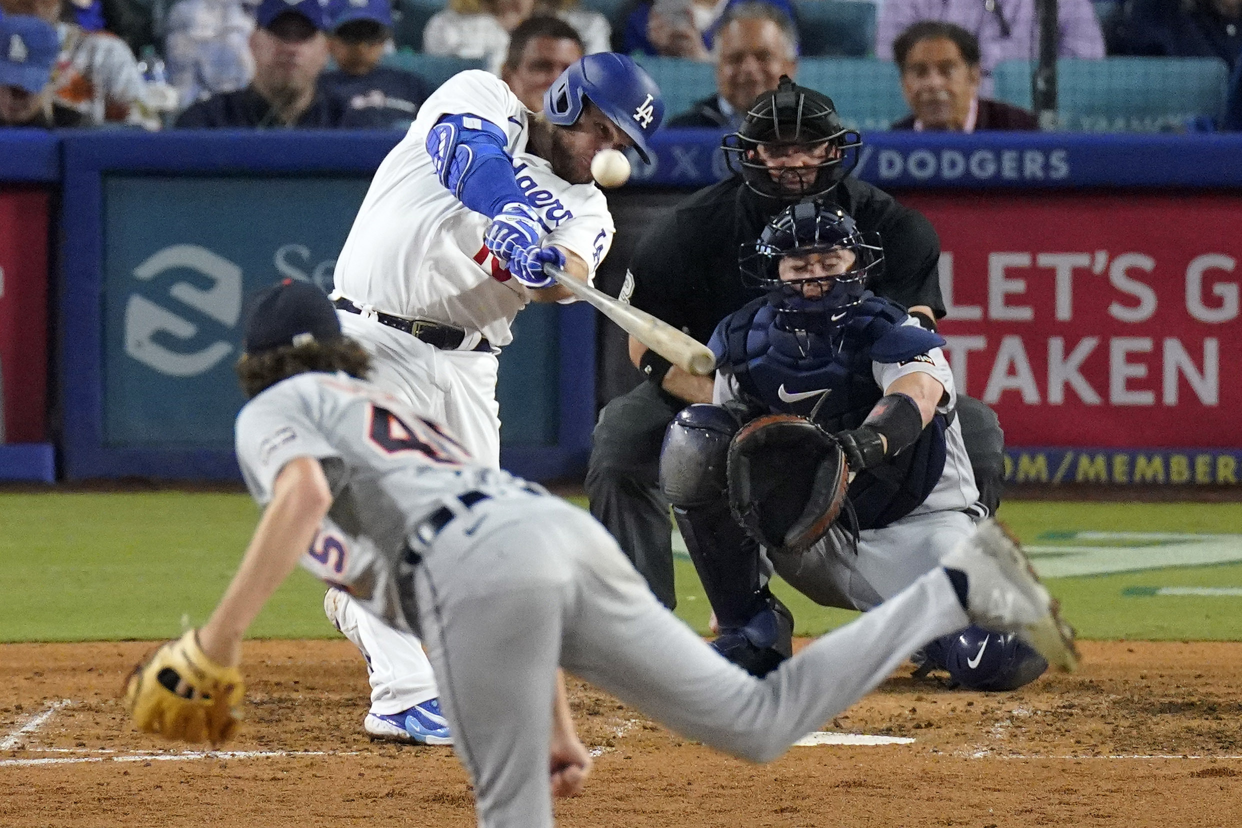 The Dodgers’ Max Muncy hits a solo home run off...