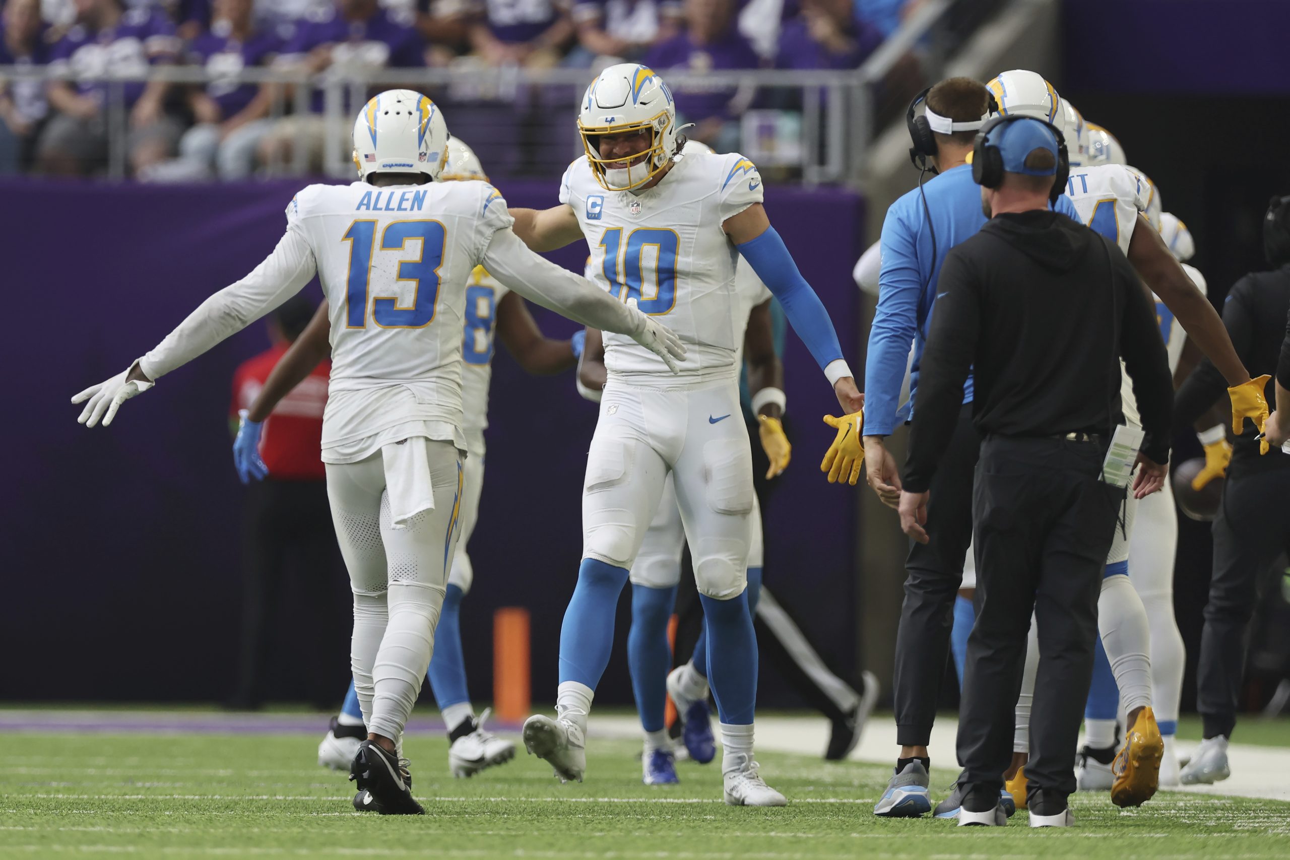 Los Angeles Chargers quarterback Justin Herbert celebrates with wide receiver...