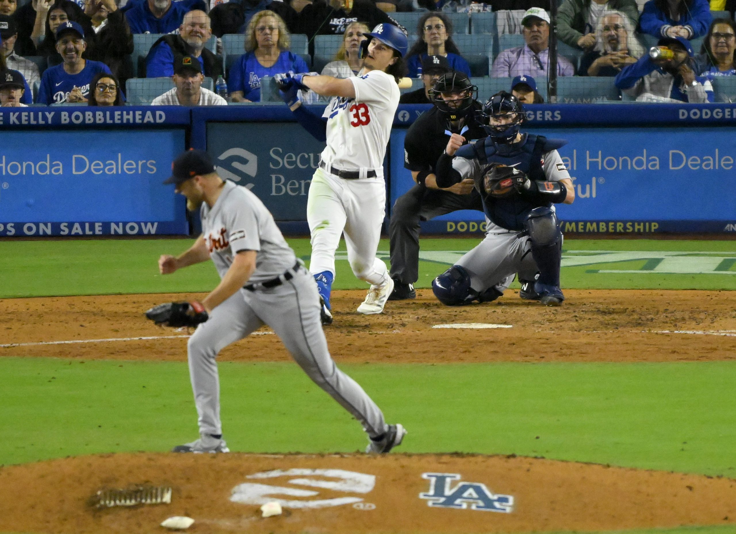 Detroit Tigers relief pitcher Will Vest, left, reacts after striking...