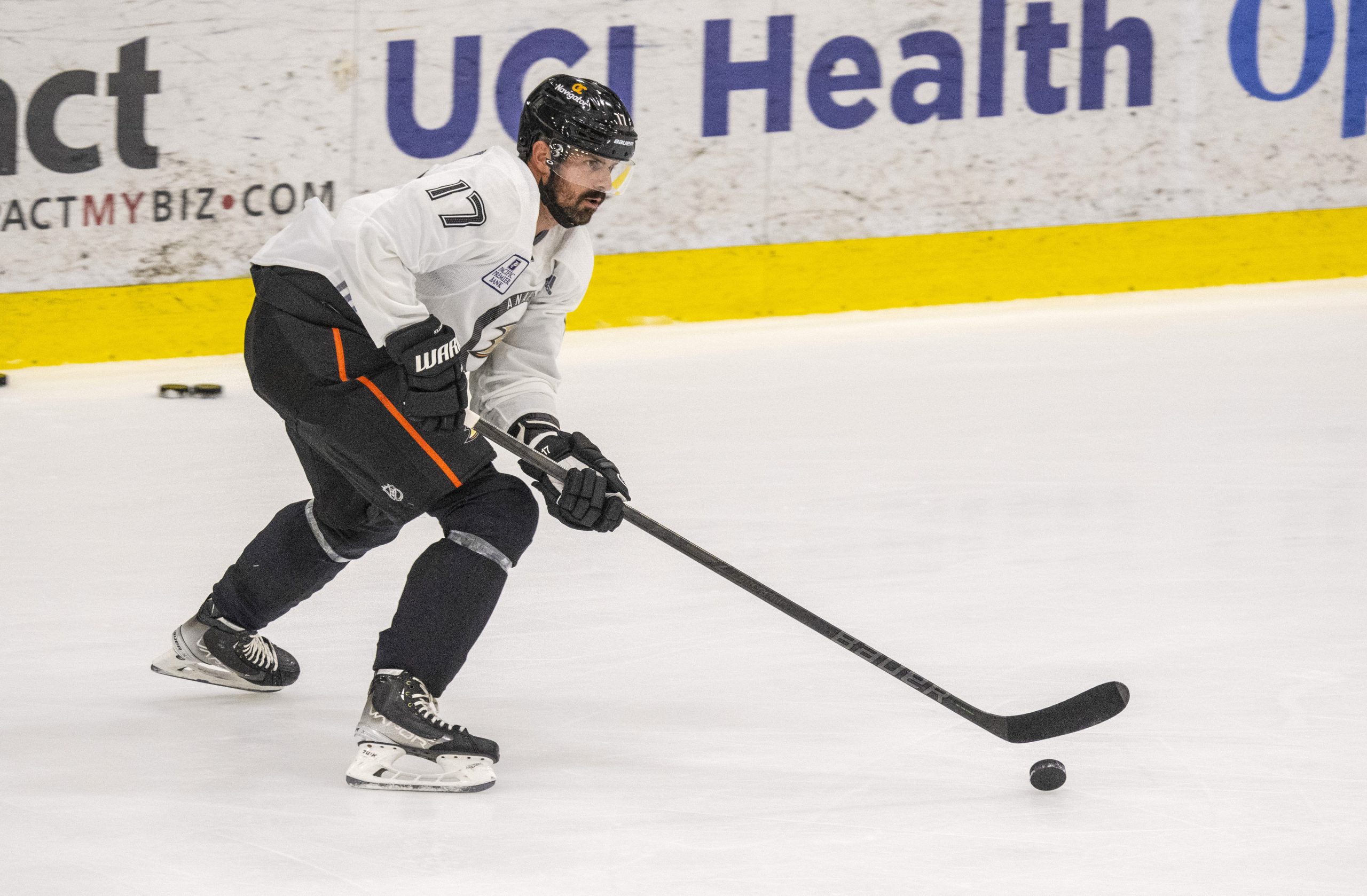 New Ducks forward Alex Killorn skates with the puck during...