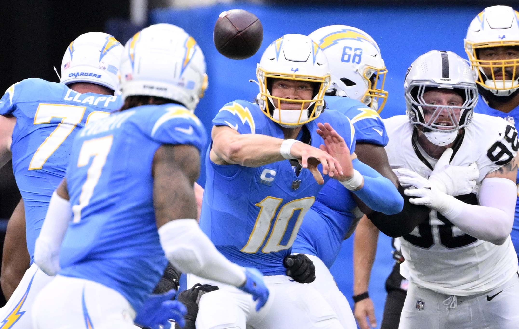 Quarterback Justin Herbert #10 of the Los Angeles Chargers passes...