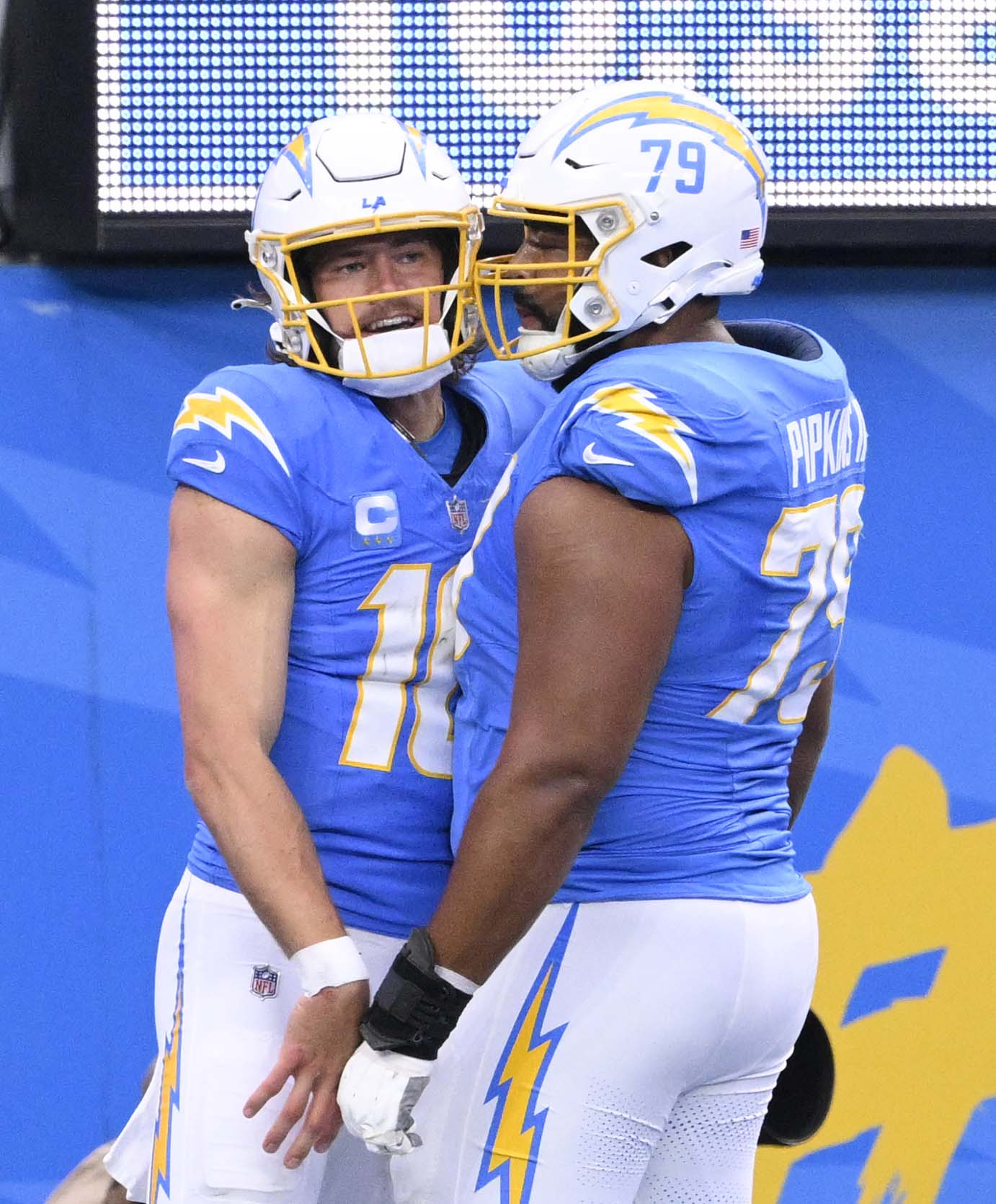 Quarterback Justin Herbert #10 of the Los Angeles Chargers celebrates...