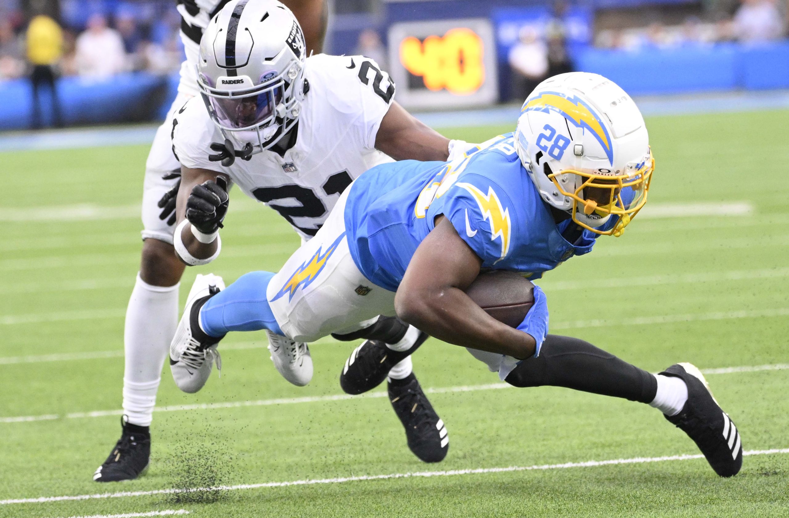 Running back Isaiah Spiller #28 of the Los Angeles Chargers...