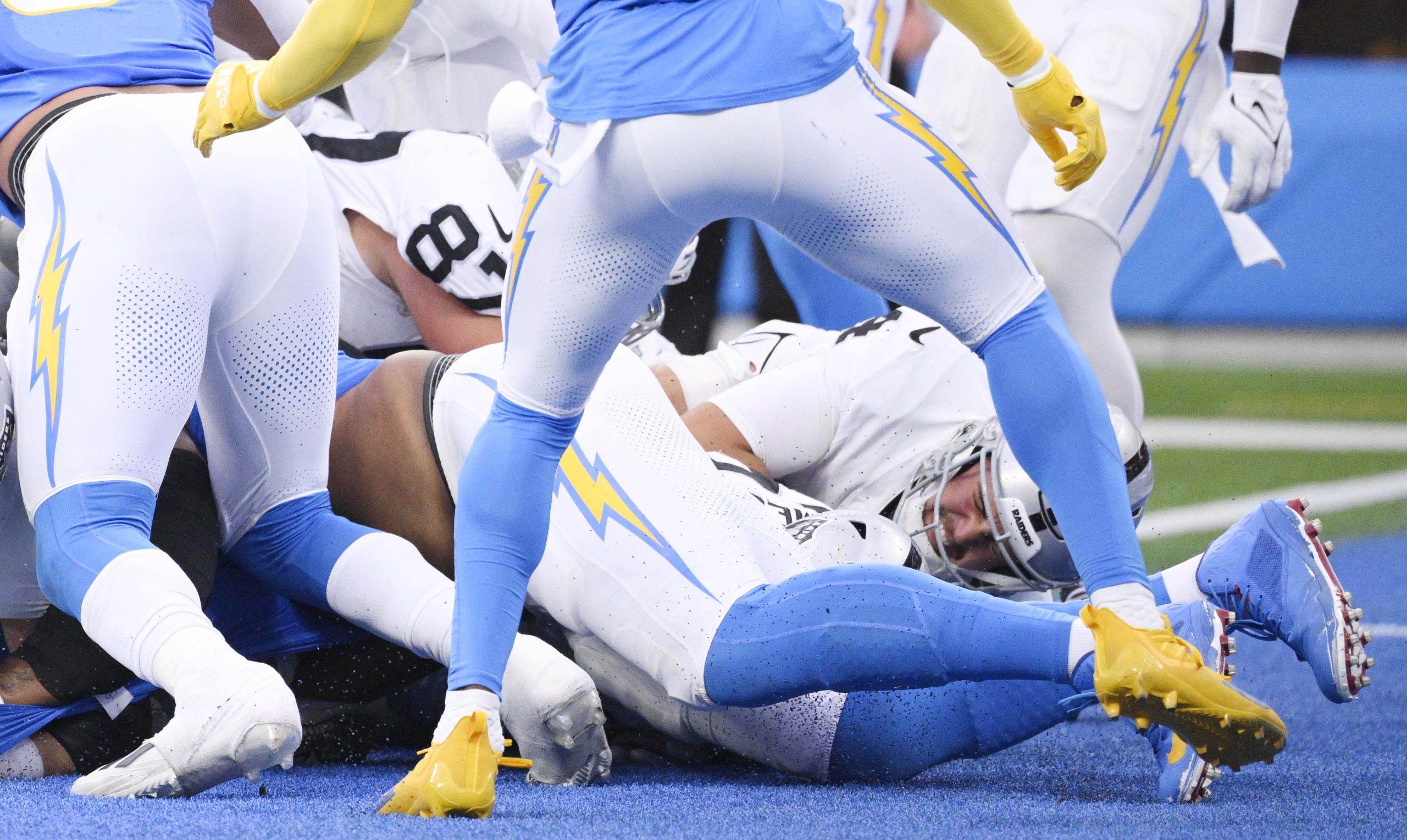 Quarterback Aidan O’Connell #4 of the Las Vegas Raiders dives...