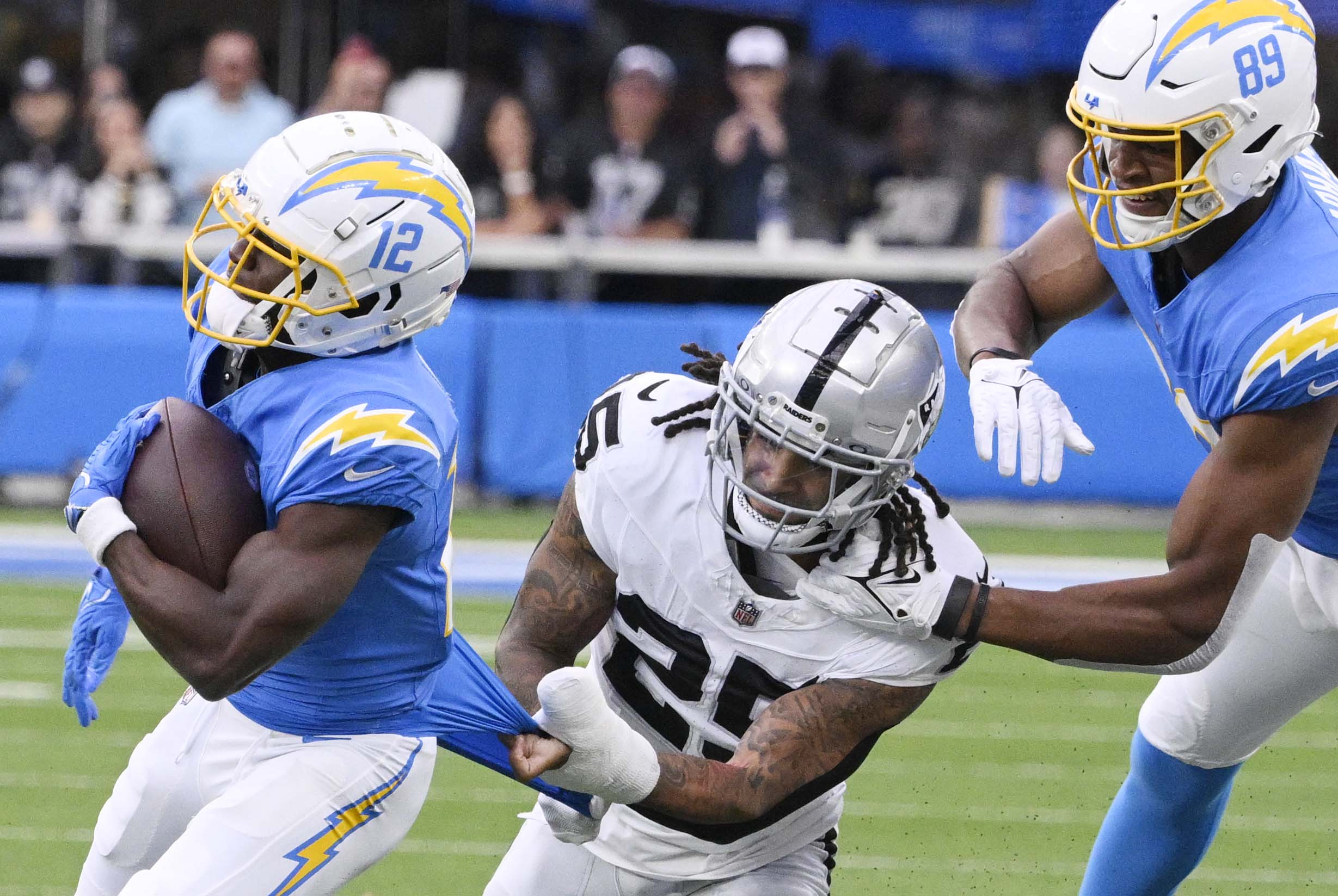 Wide receiver Derius Davis #12 of the Los Angeles Chargers...