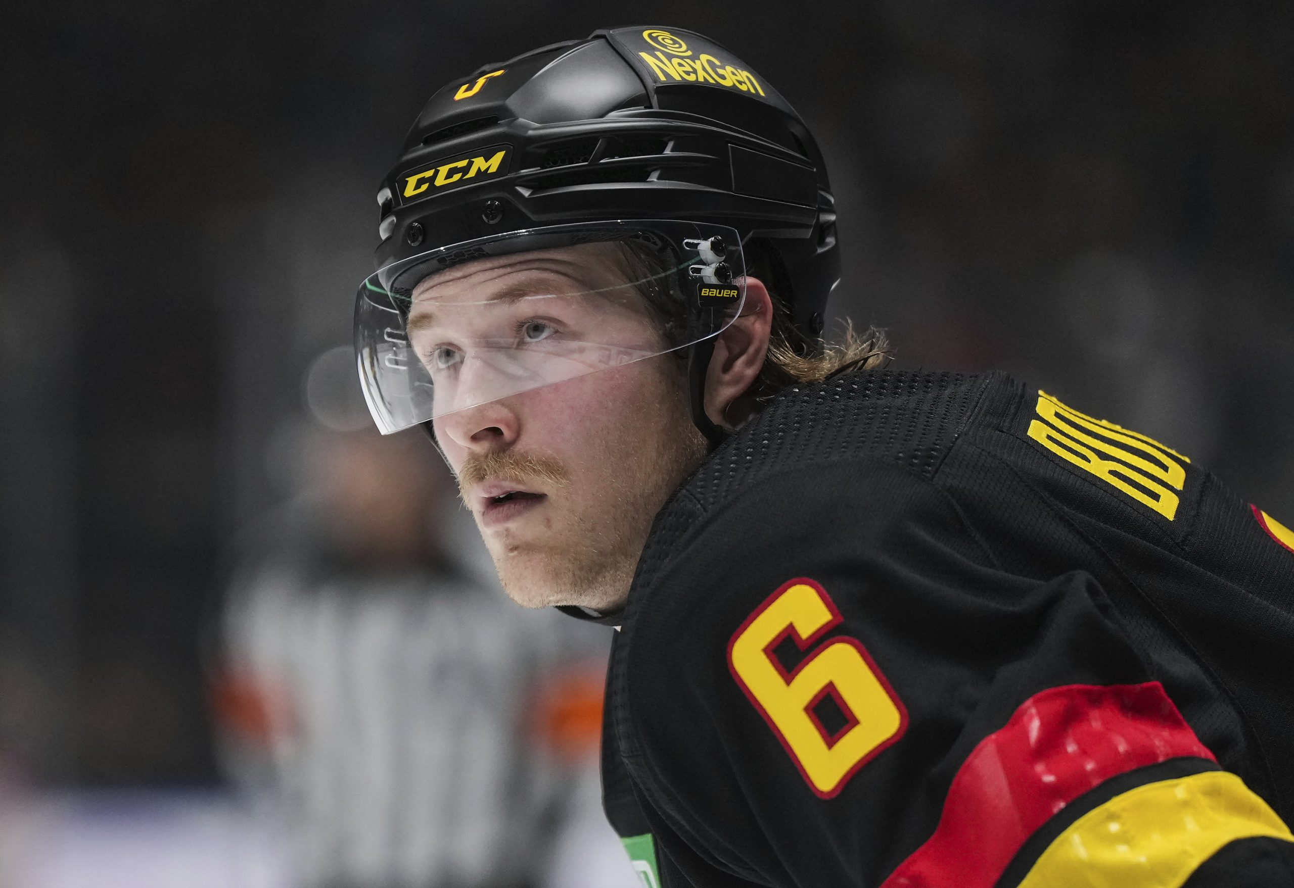 The Vancouver Canucks’ Brock Boeser waits for a faceoff during...