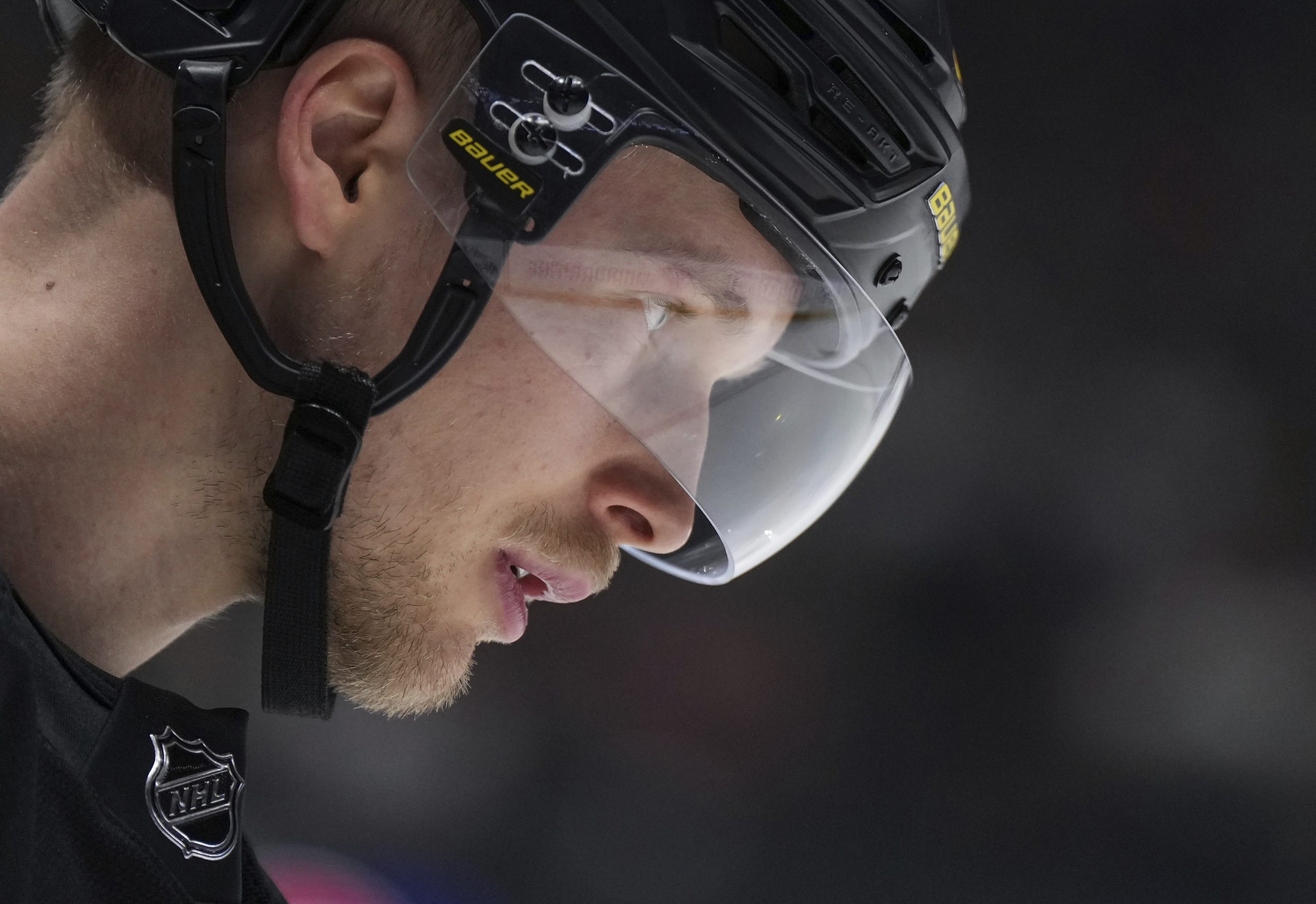 The Vancouver Canucks’ Elias Pettersson skates during a stoppage in...
