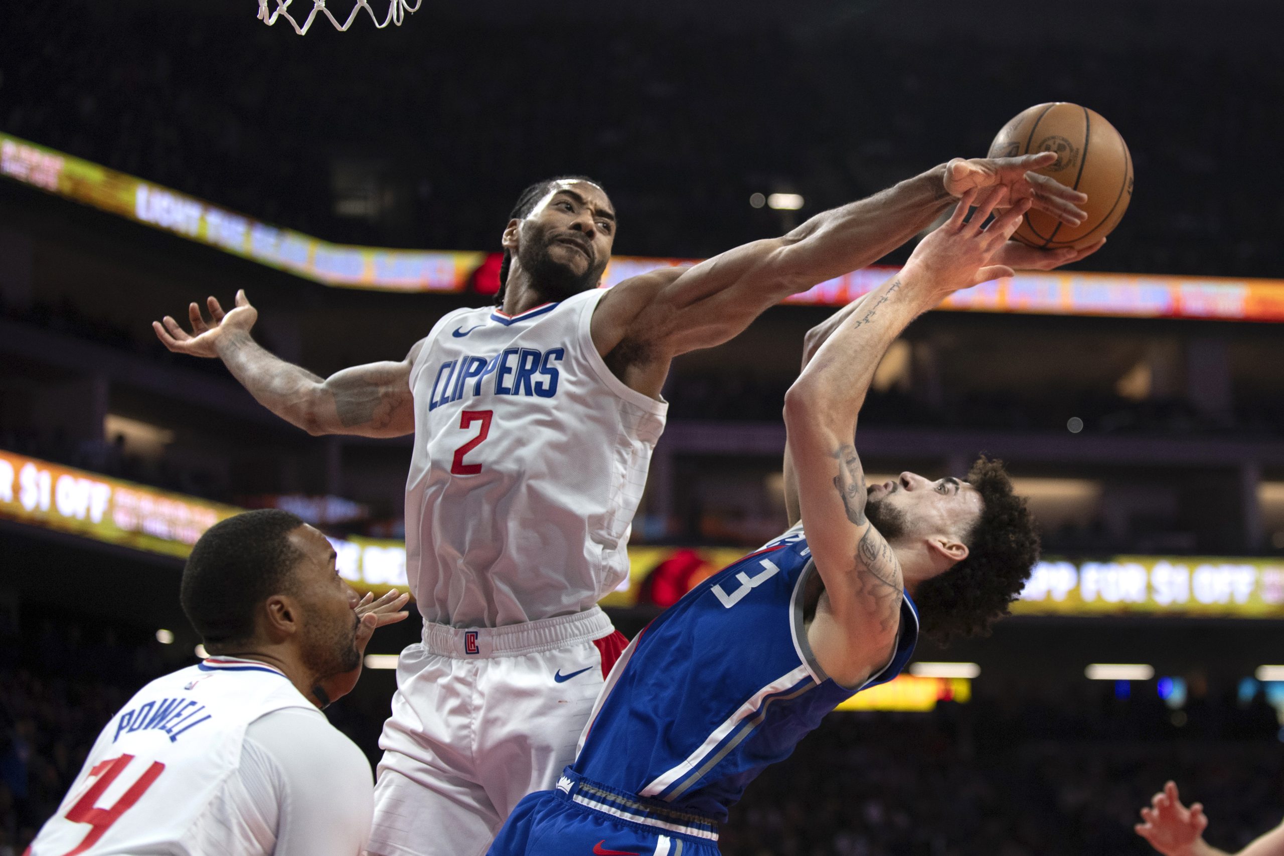 Sacramento Kings guard Chris Duarte (3) is fouled by Clippers...