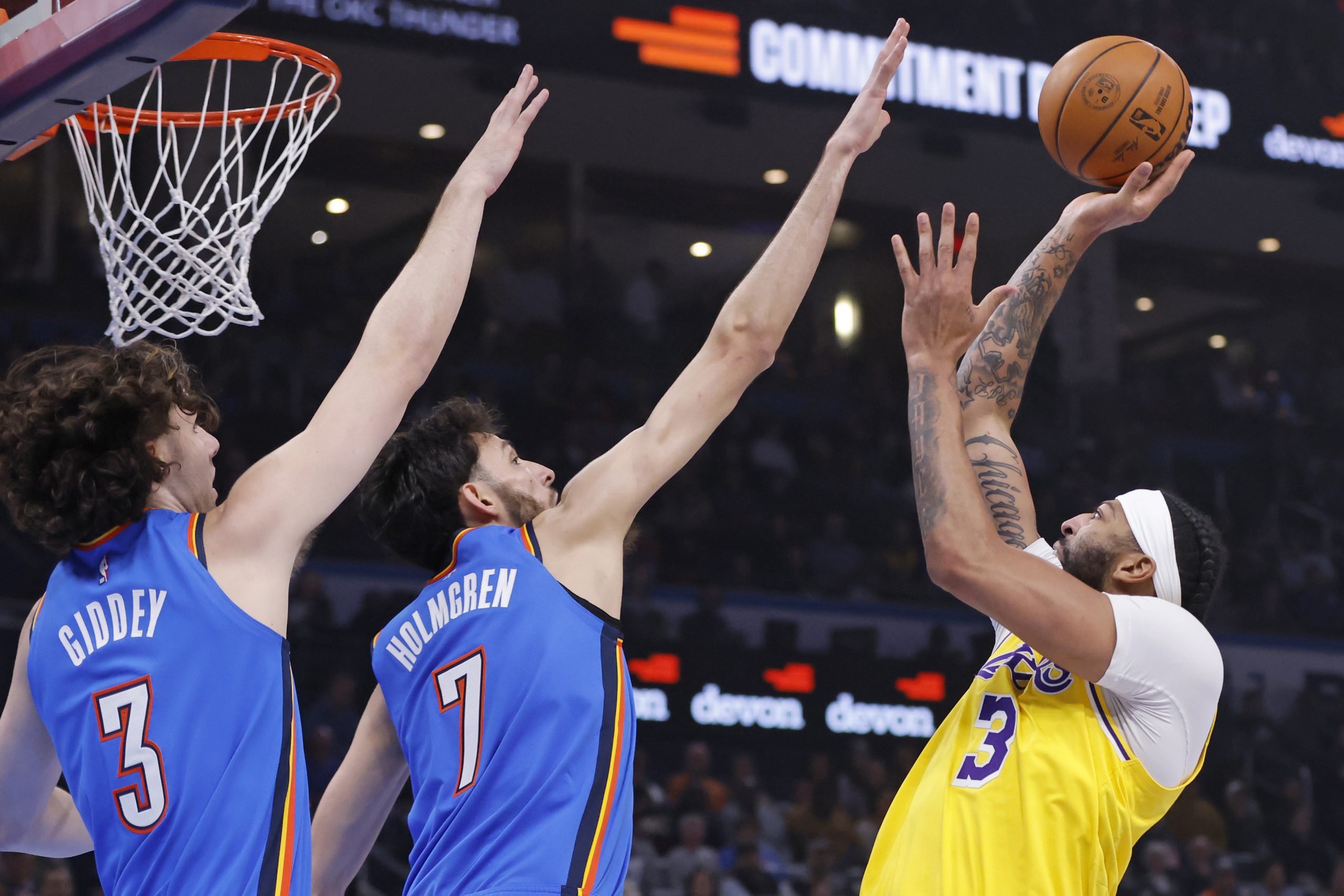 Lakers forward Anthony Davis shoots as Oklahoma City Thunder guard...
