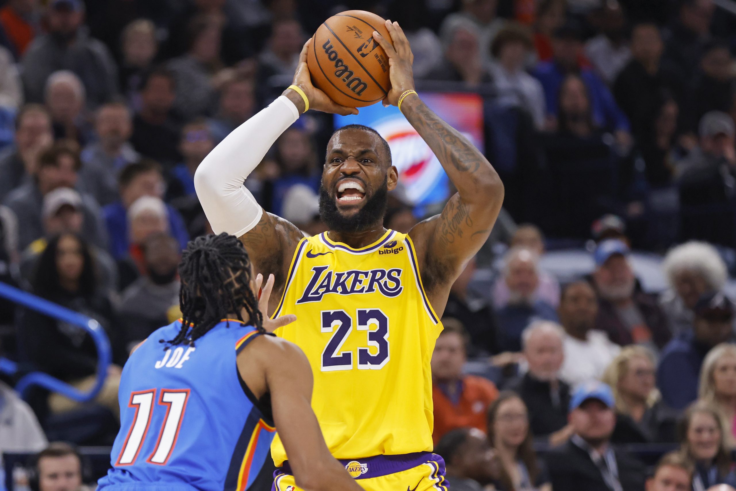 Lakers forward LeBron James looks to pass as Oklahoma City...