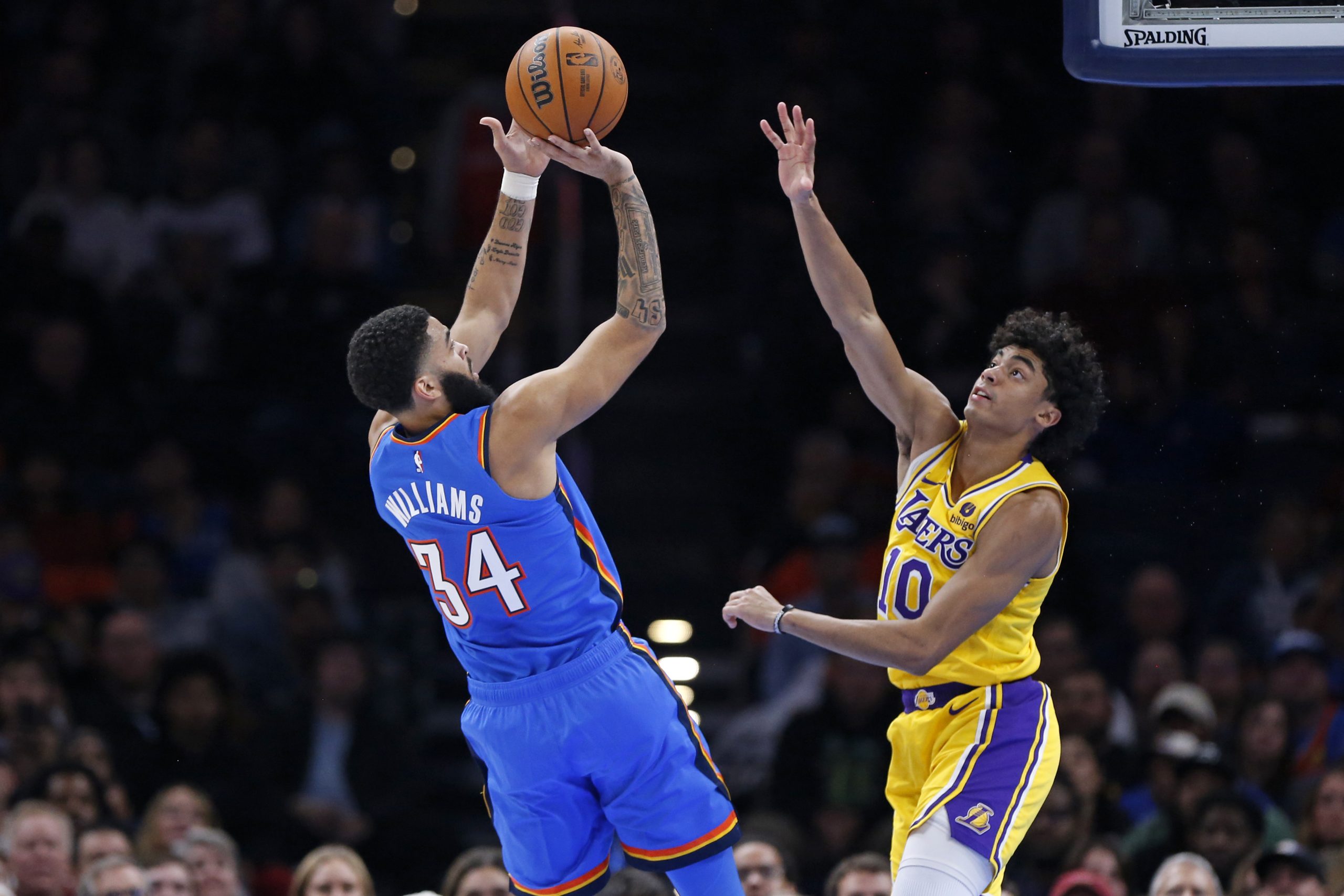 Oklahoma City Thunder forward Kenrich Williams shoots over Lakers guard...