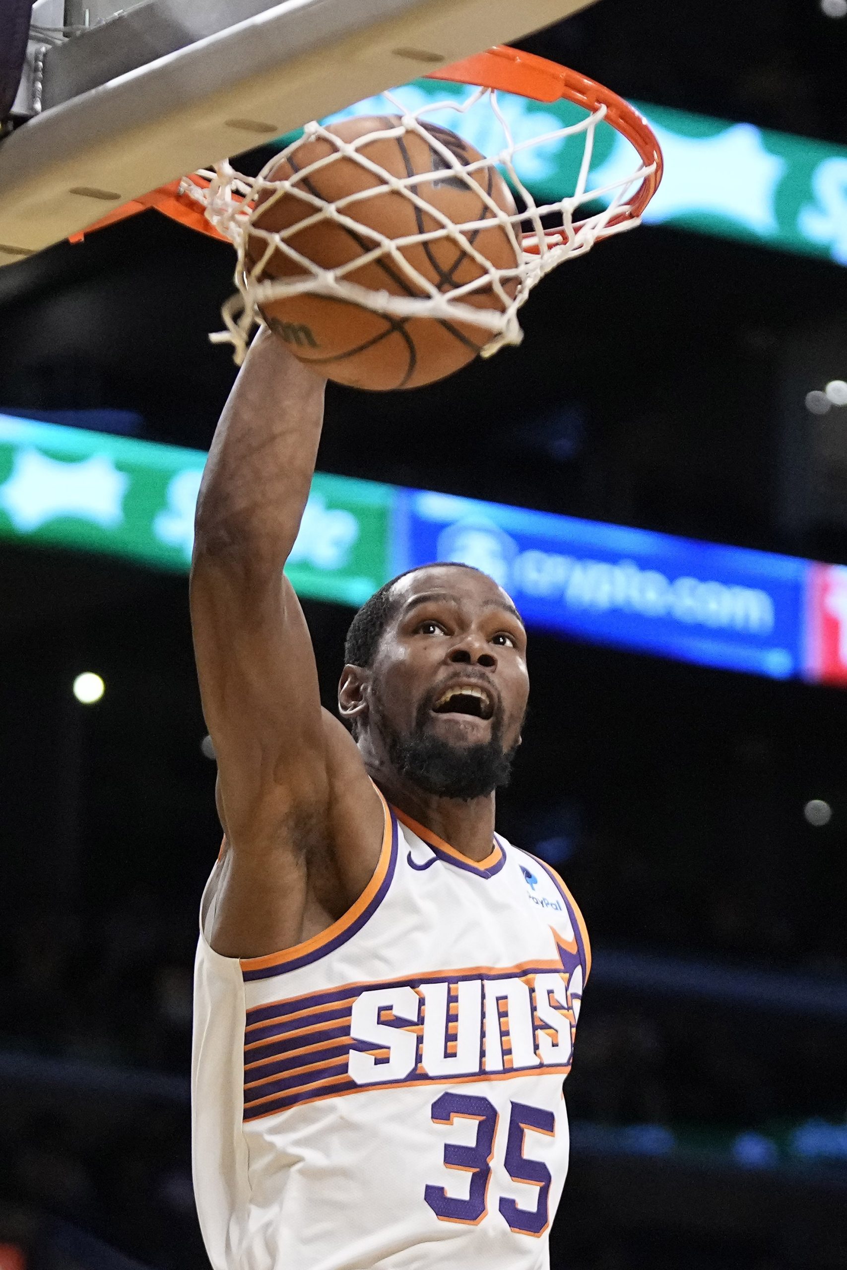 Phoenix Suns forward Kevin Durant dunks during the second half...
