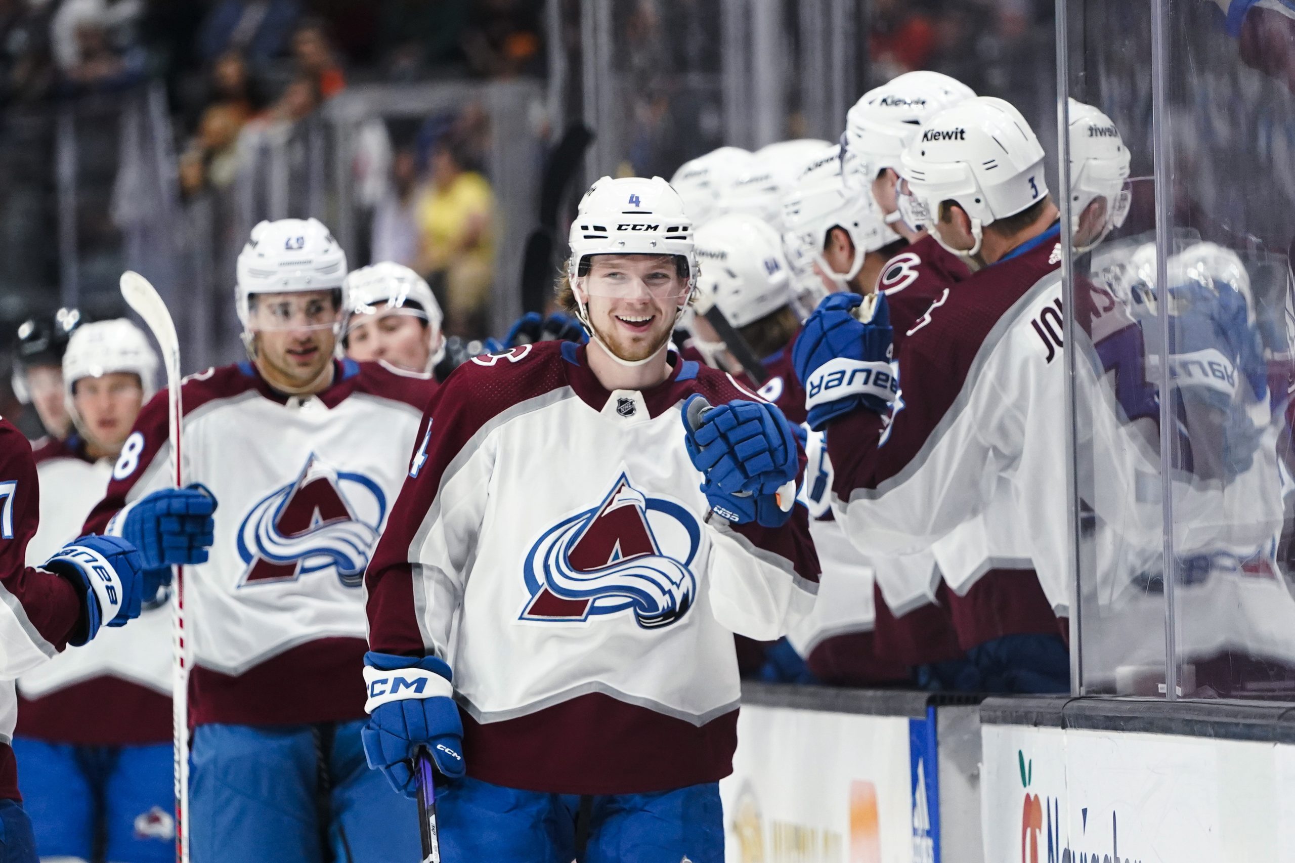 Colorado Avalanche defenseman Bowen Byram is congratulated for his goal...