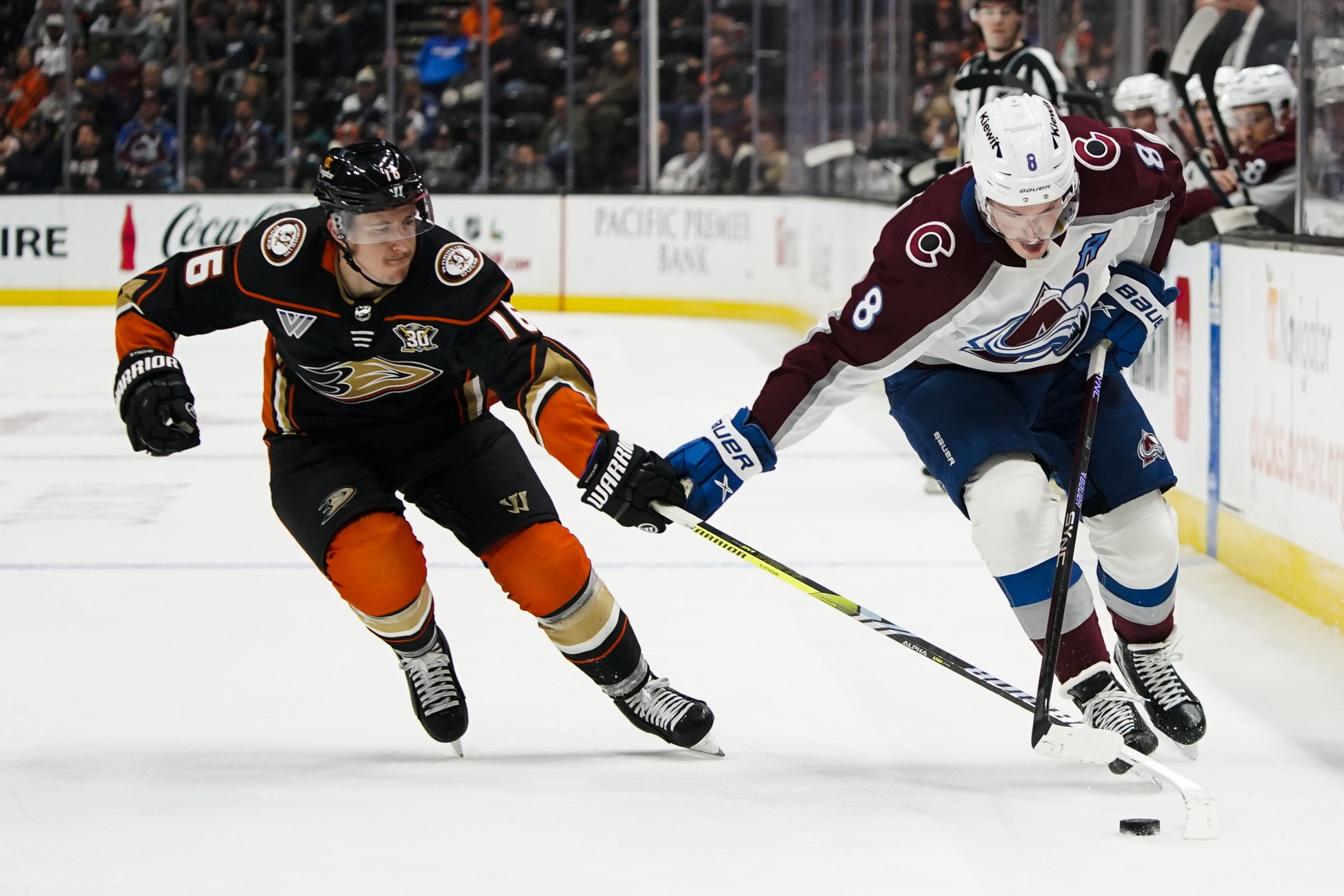 Colorado Avalanche defenseman Cale Makar, right, and Anaheim Ducks center...