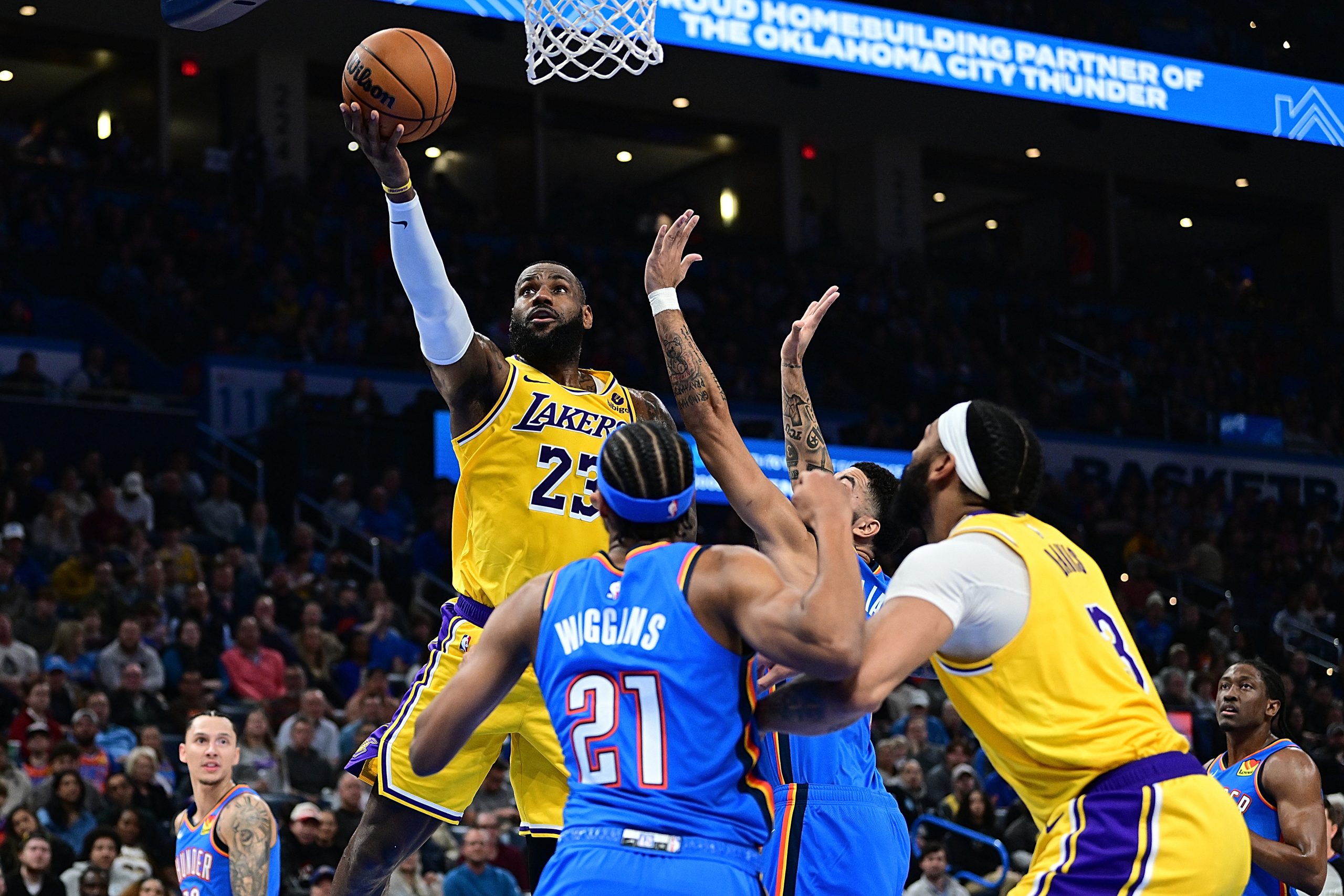 Lakers star Lebron James gets to the basket during the...