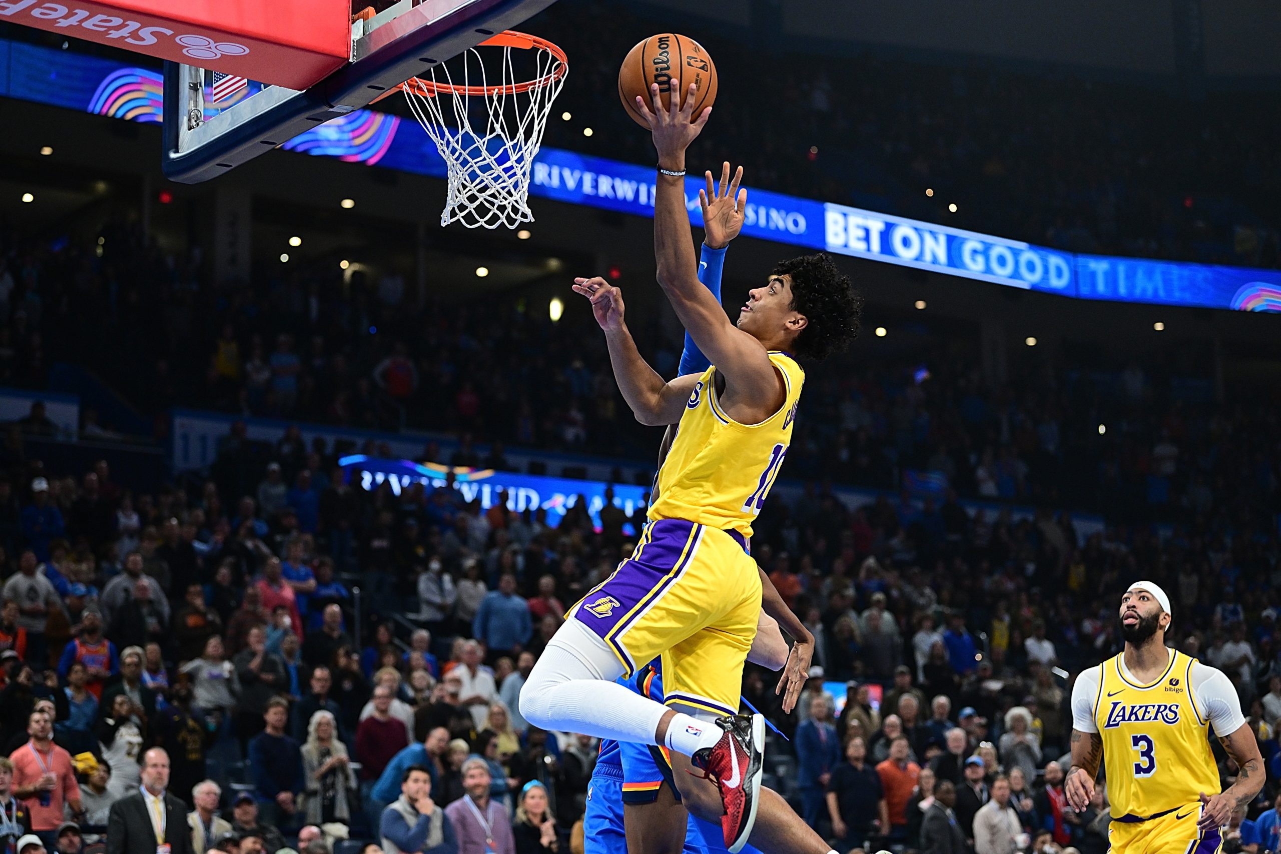 Lakers guard Max Christie gets to the basket during the...