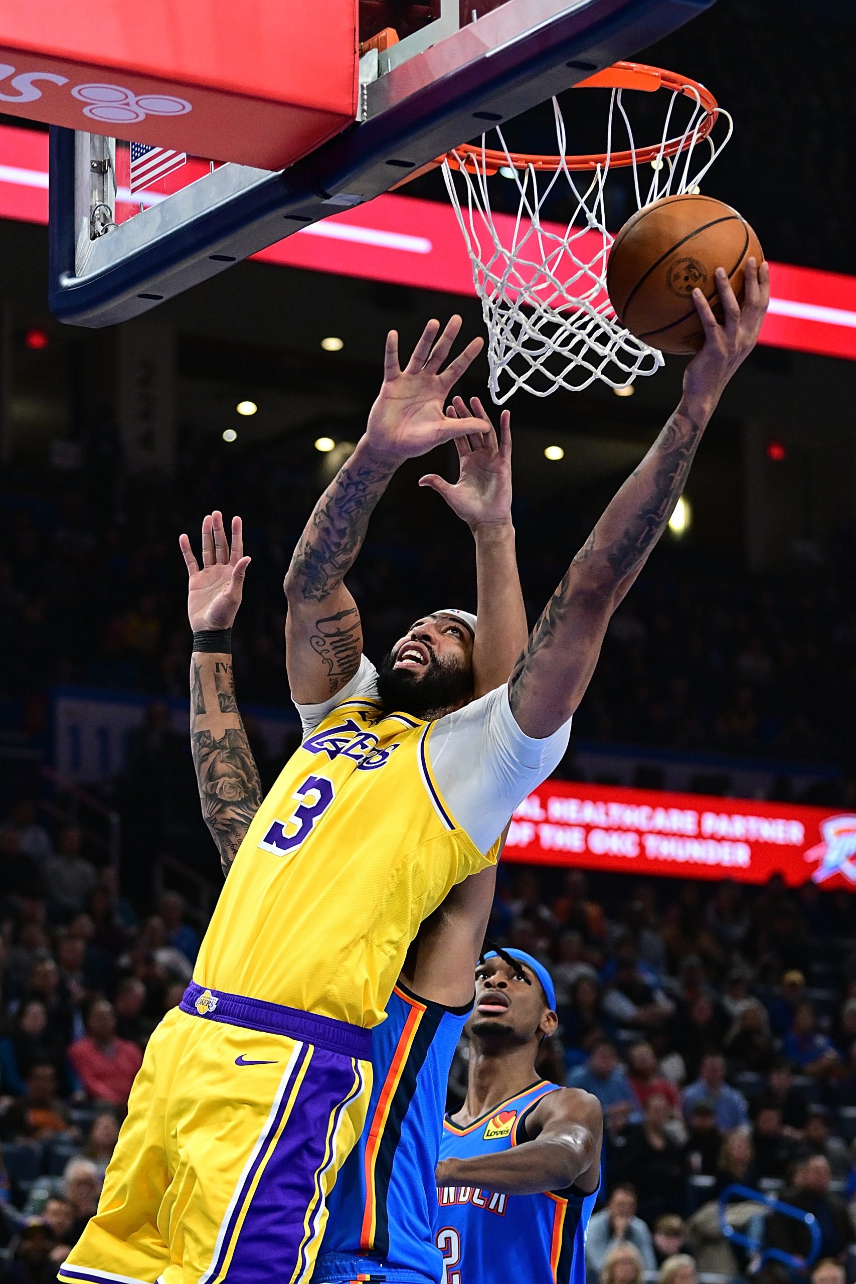 Lakers star Anthony Davis goes up for a shot during...