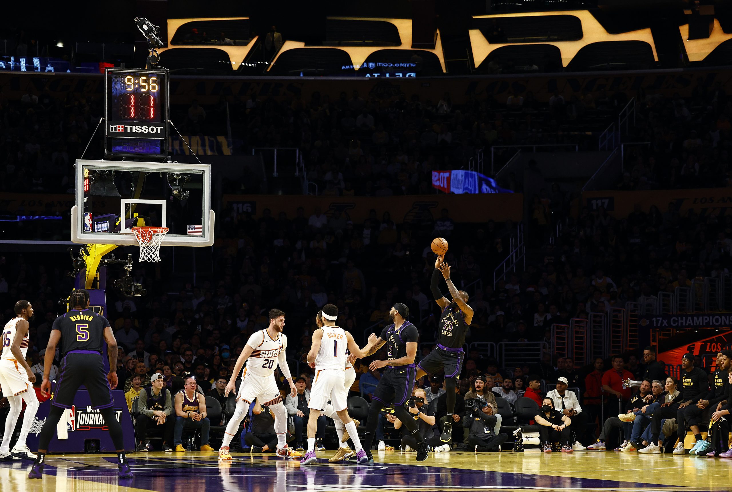Lakers star LeBron James takes a shot during the first...
