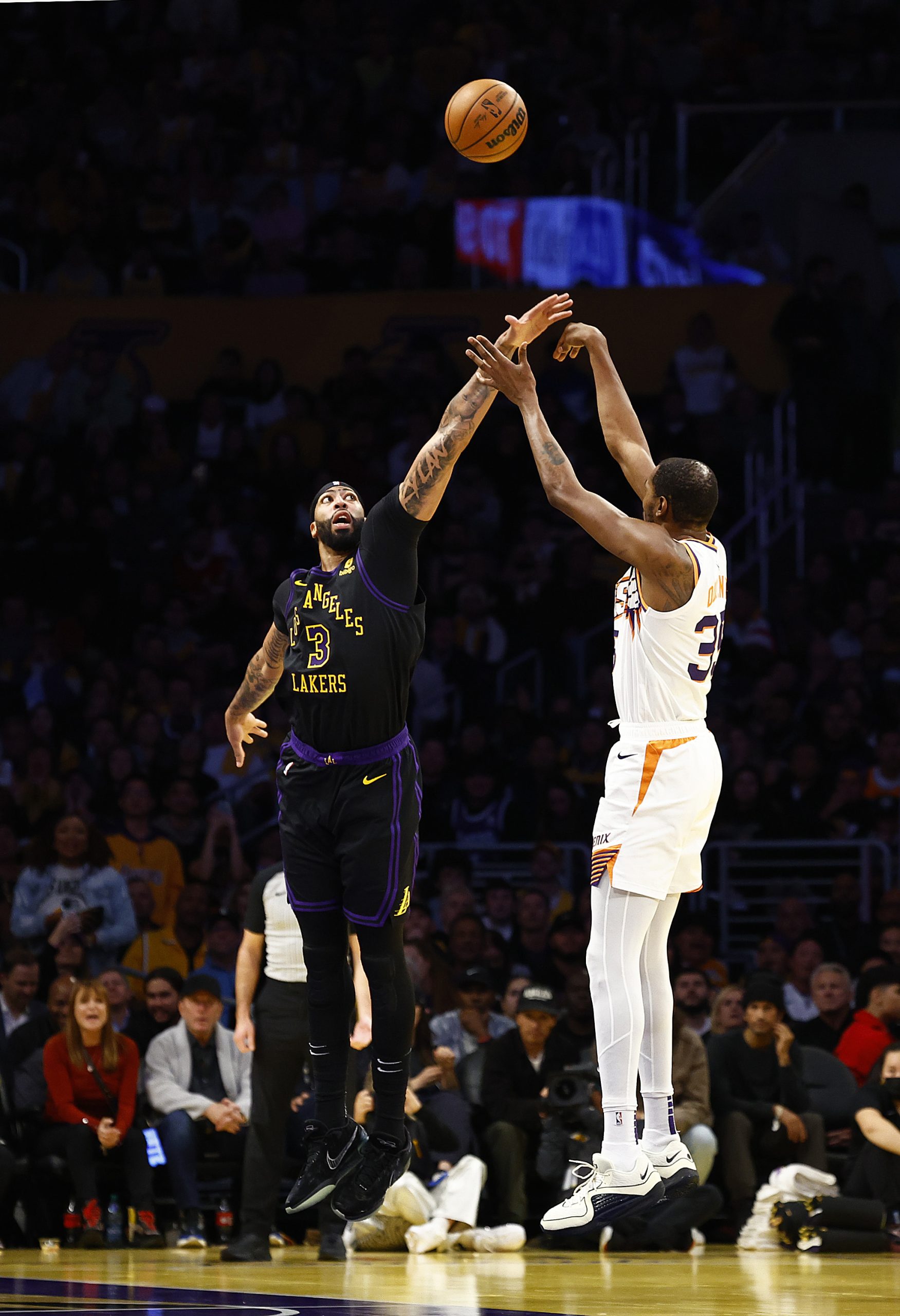 Phoenix Suns forward Kevin Durant takes a 3-point shot as...