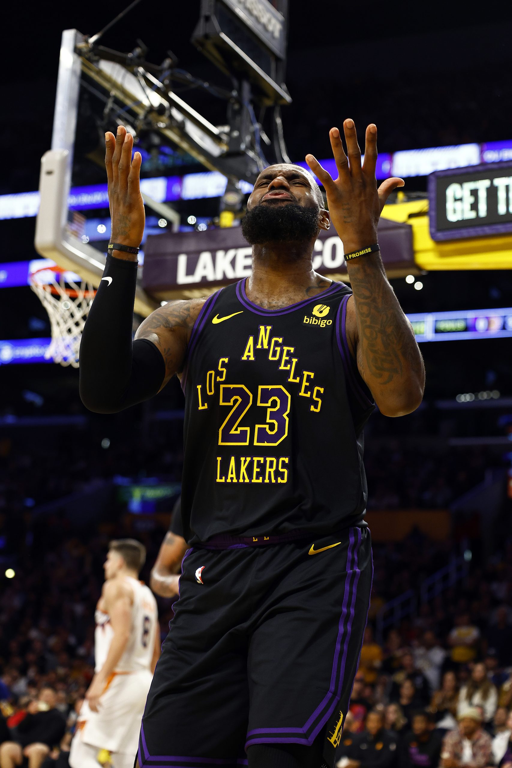 Lakers star LeBron James gestures after being fouled during the...