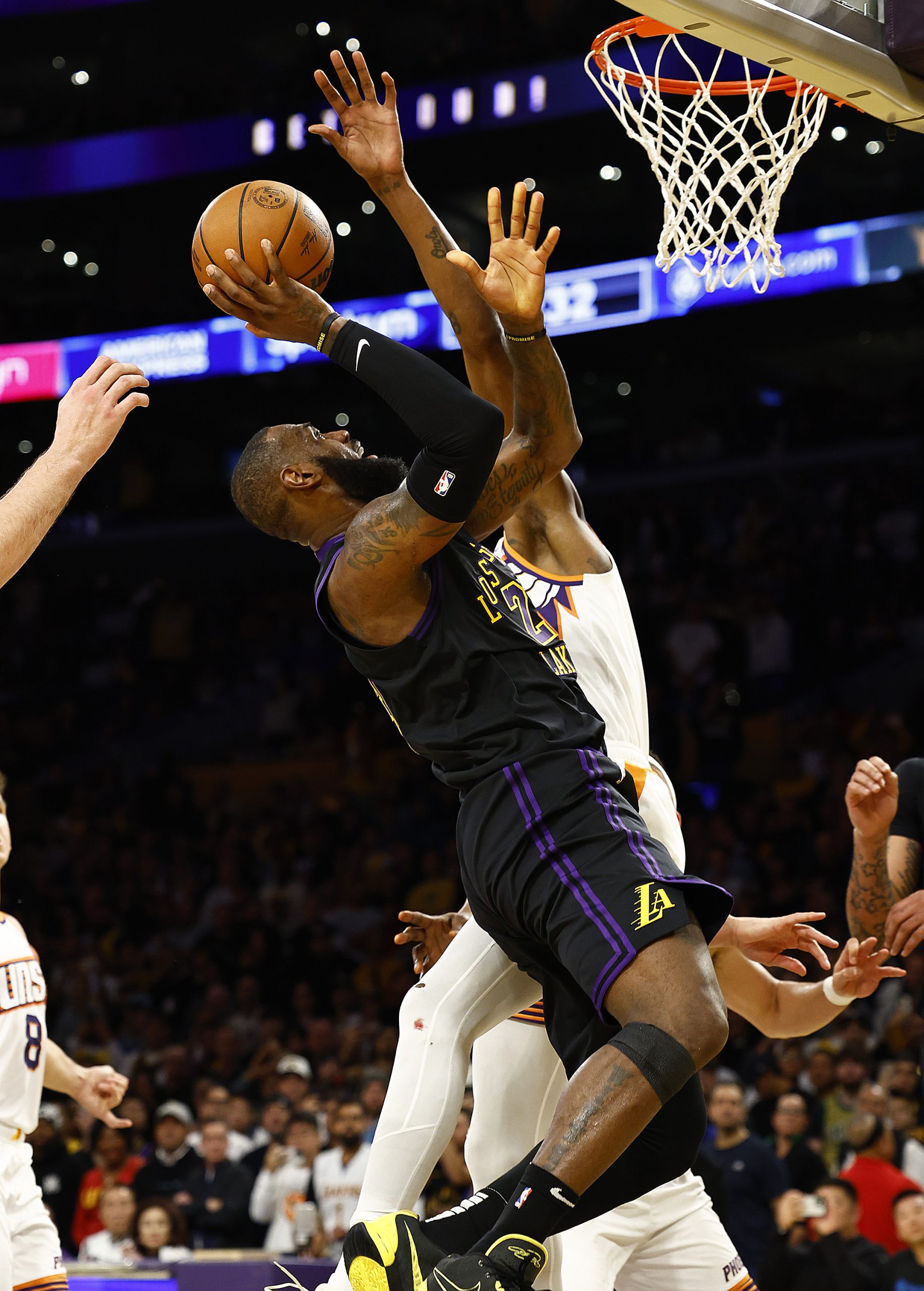 Lakers forward LeBron James takes a shot during the second...