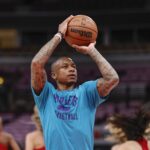Charlotte Hornets guard Isaiah Thomas (4) warms up before an NBA game against the Chicago Bulls at United Center.