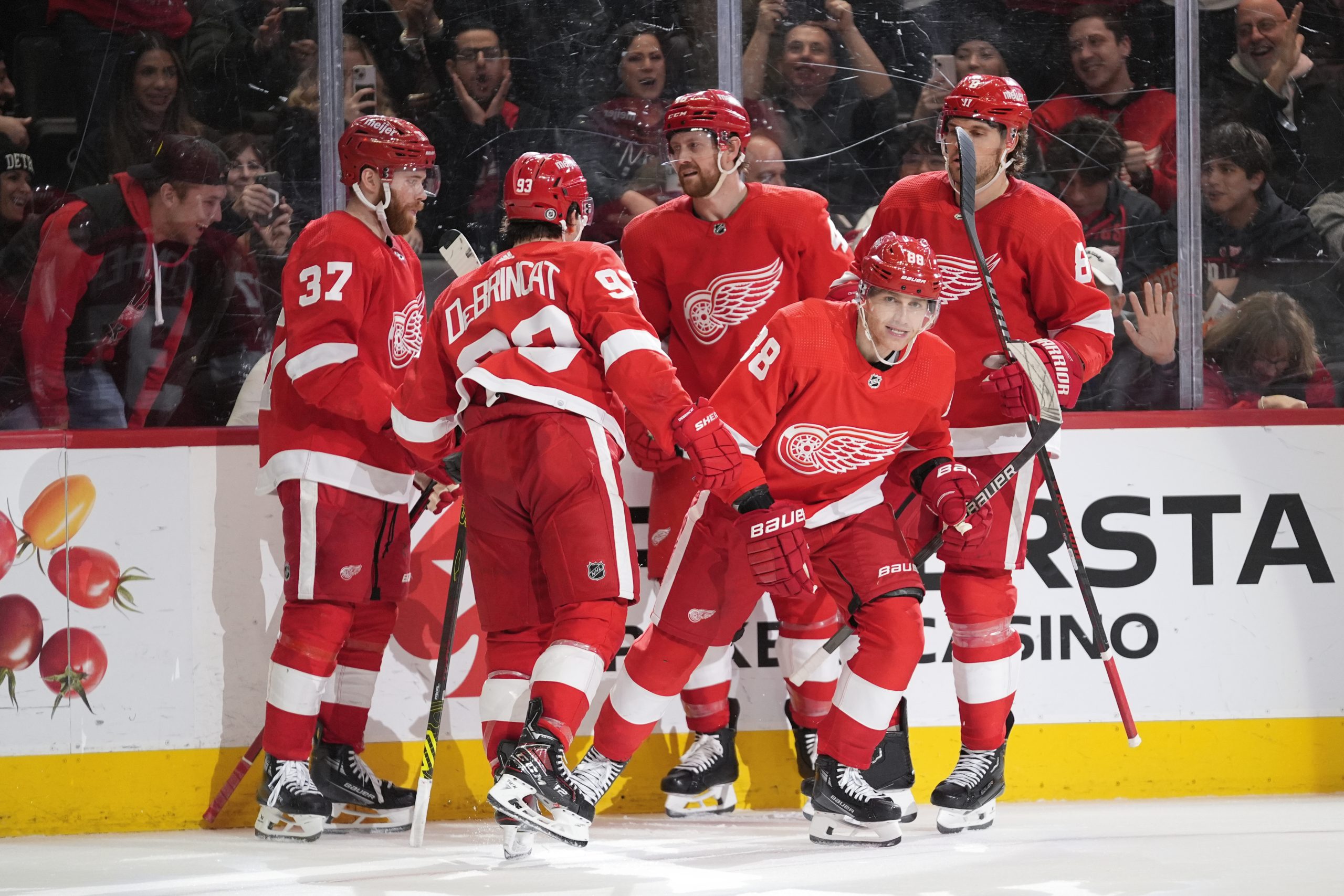 Detroit Red Wings right wing Patrick Kane (88) celebrates his...