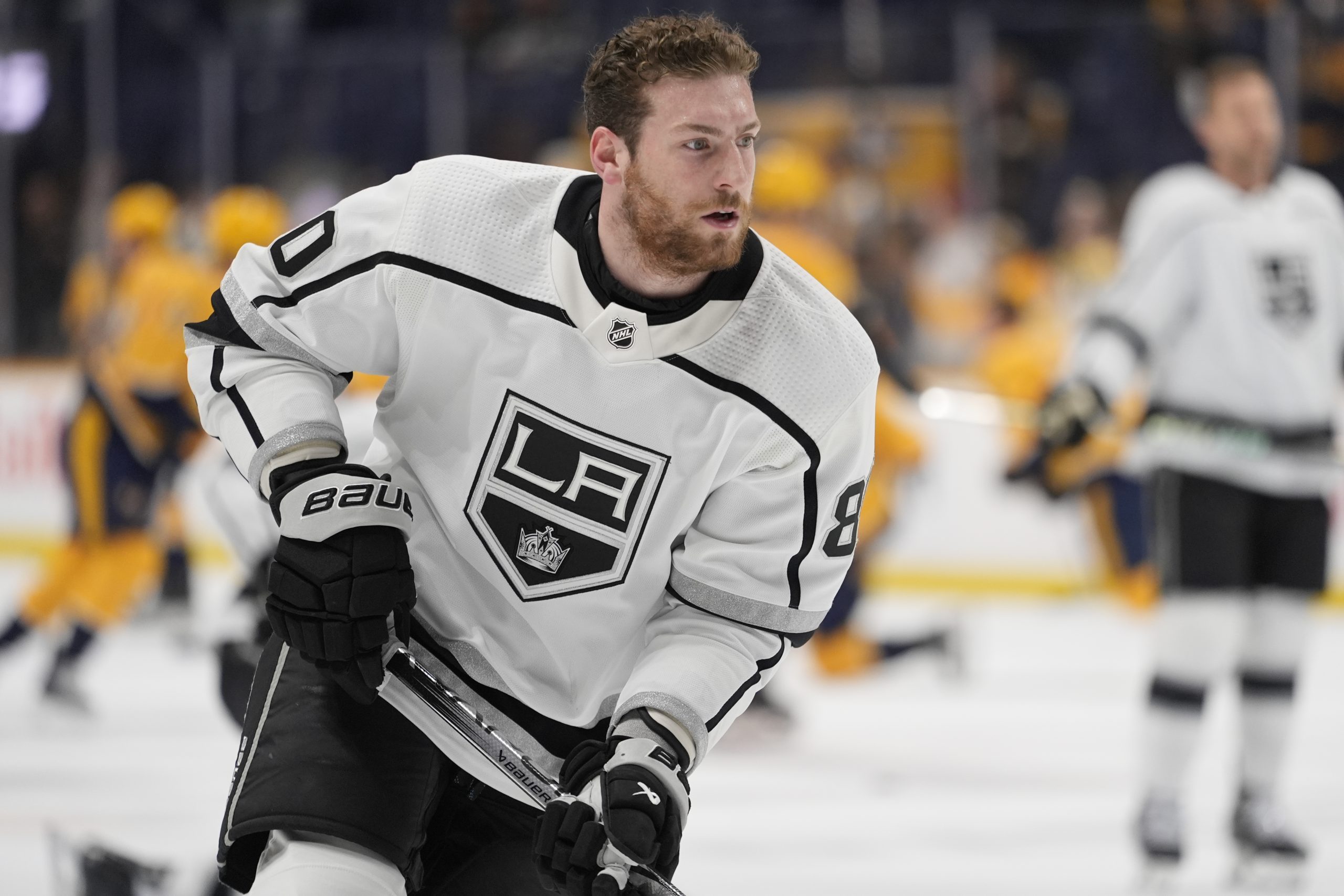 Kings center Pierre-Luc Dubois warms up before their game against...