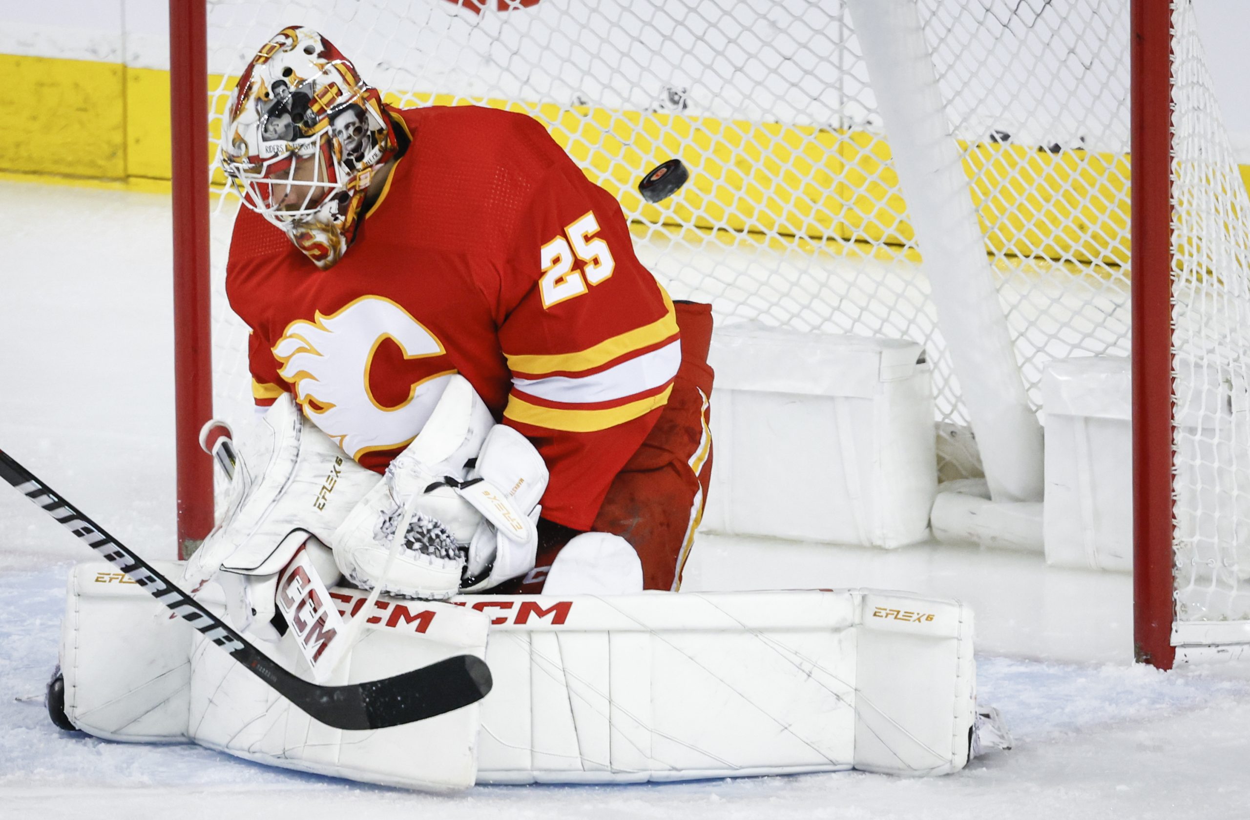 Calgary Flames goalie Jacob Markstrom stops a shot during the...