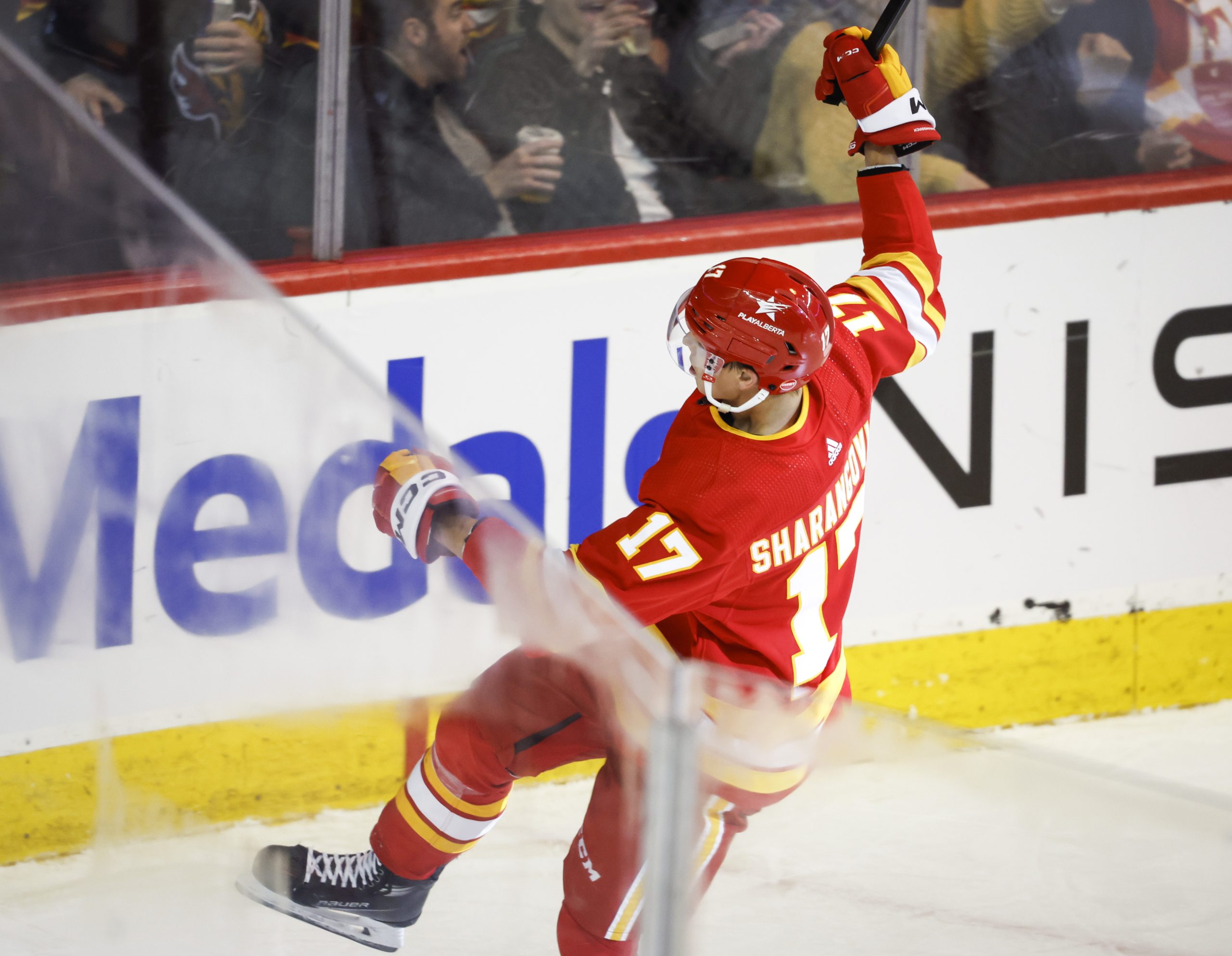 Calgary Flames forward Yegor Sharangovich celebrates after scoring a goal...