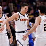 Denver Nuggets forward Michael Porter Jr celebrates with Jamal Murray