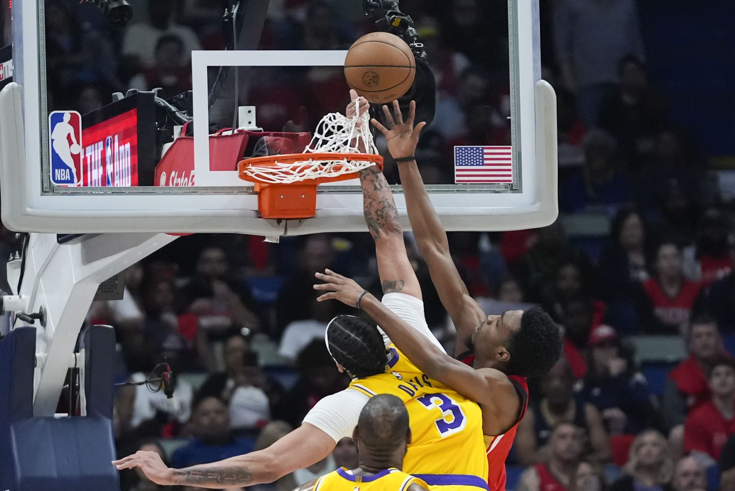 New Orleans Pelicans forward Herbert Jones goes to the basket...