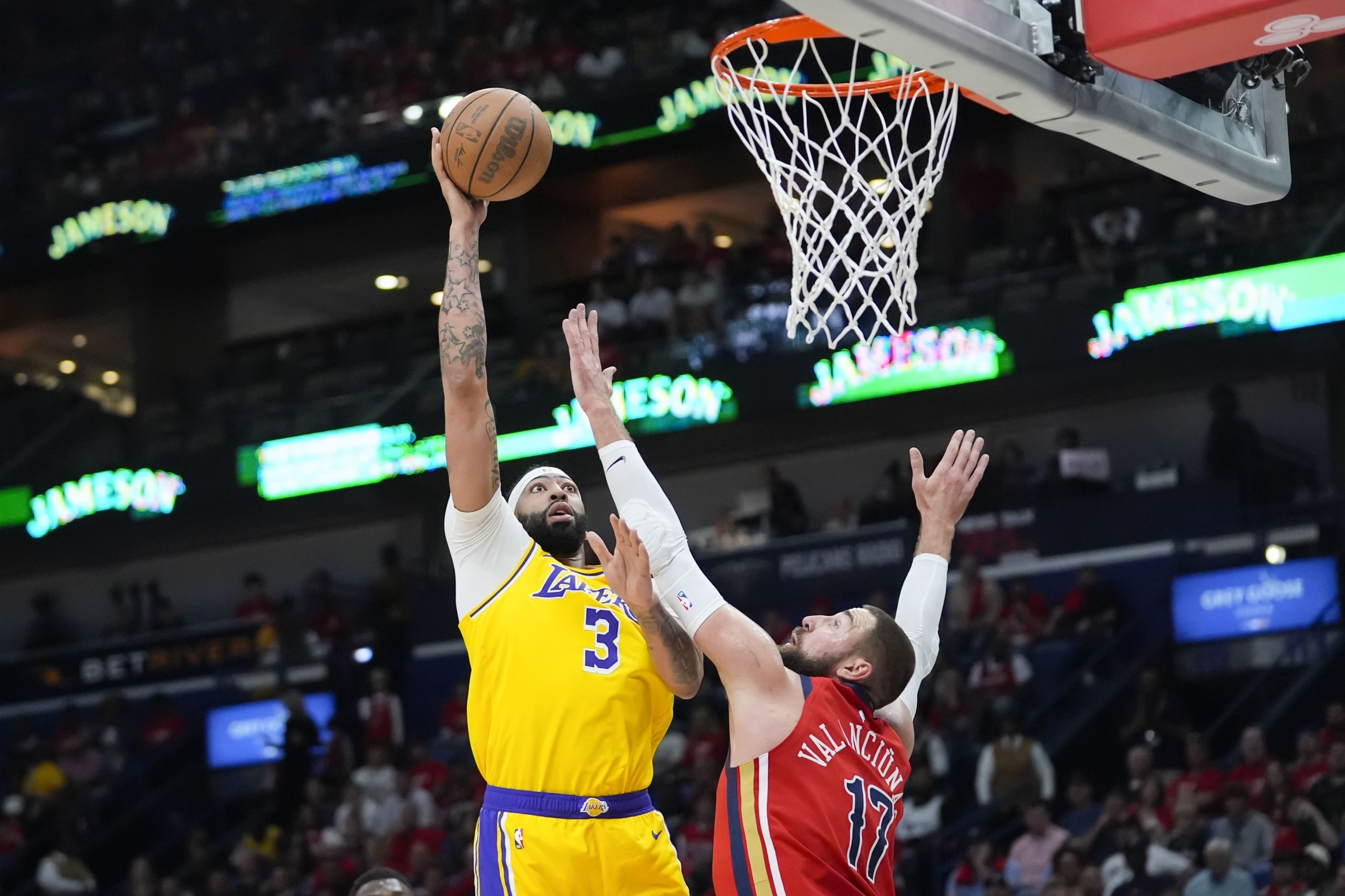 Lakers forward Anthony Davis (3) shoots against New Orleans Pelicans...