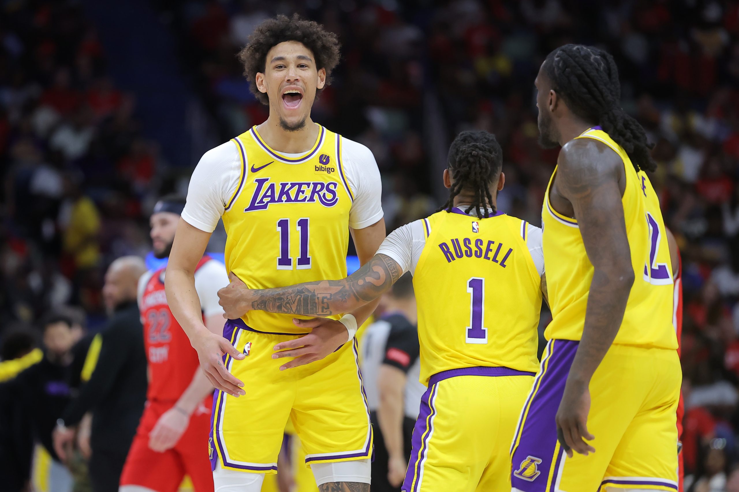Lakers center Jaxson Hayes, left, celebrates during the first half...