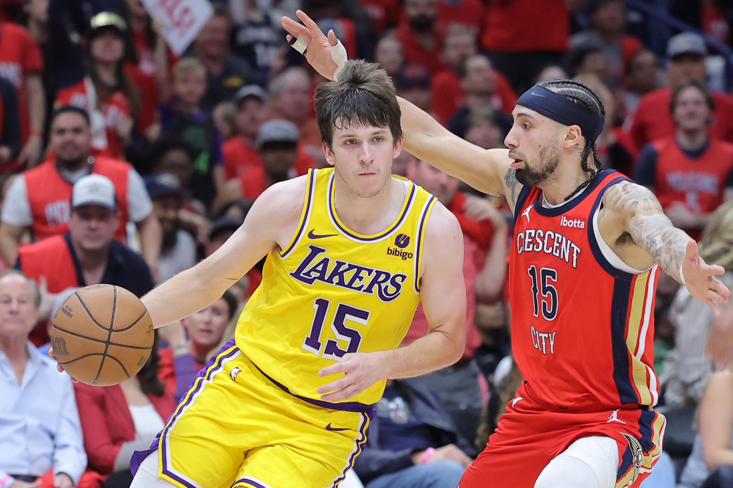 Lakers guard Austin Reaves drives as the New Orleans Pelicans’...