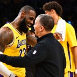 Los Angeles Lakers forward LeBron James and Los Angeles Clippers head coach Ty Lue embrace