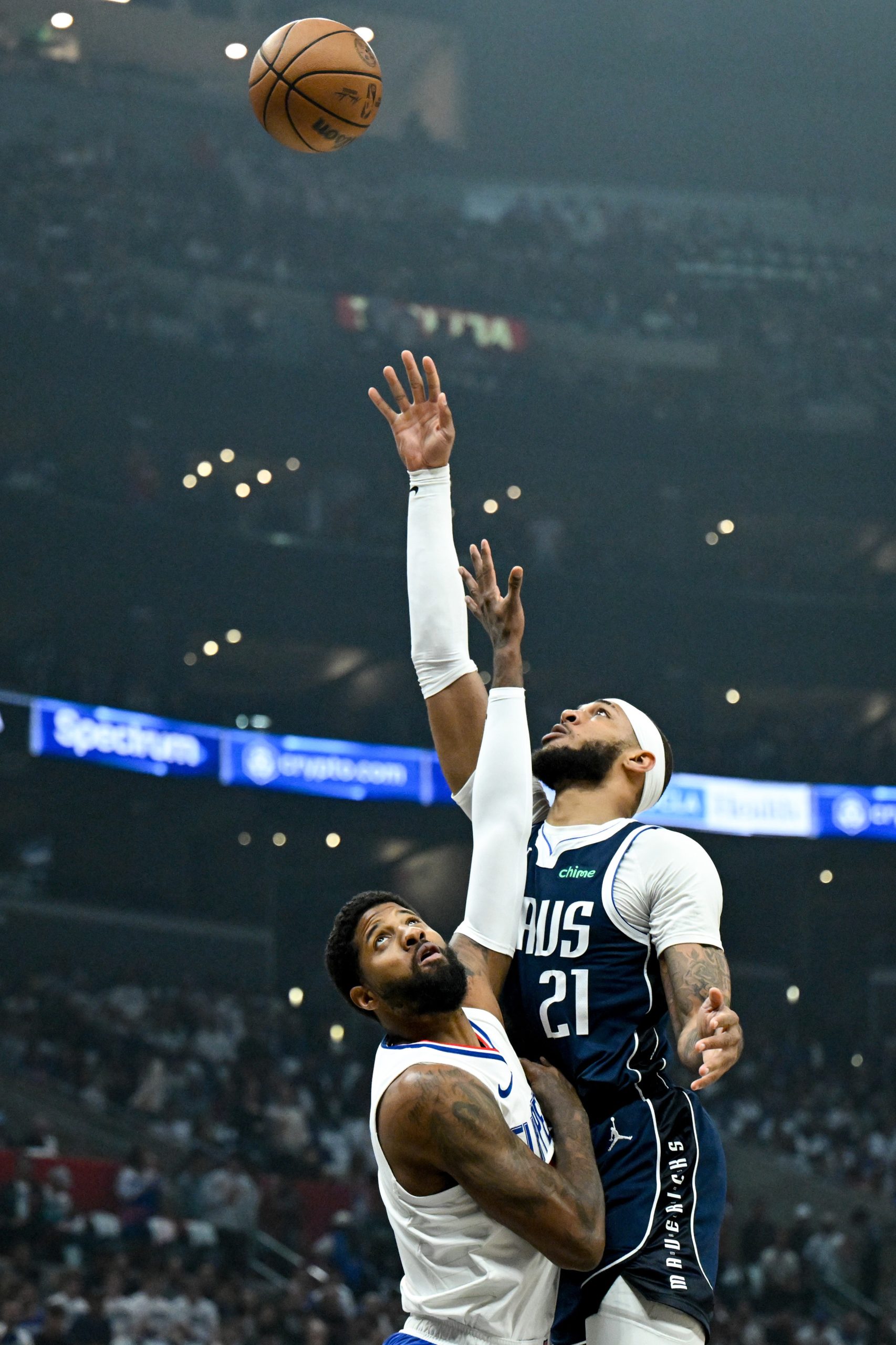 The Dallas Mavericks’ Daniel Gafford shoots over Clippers star Paul...
