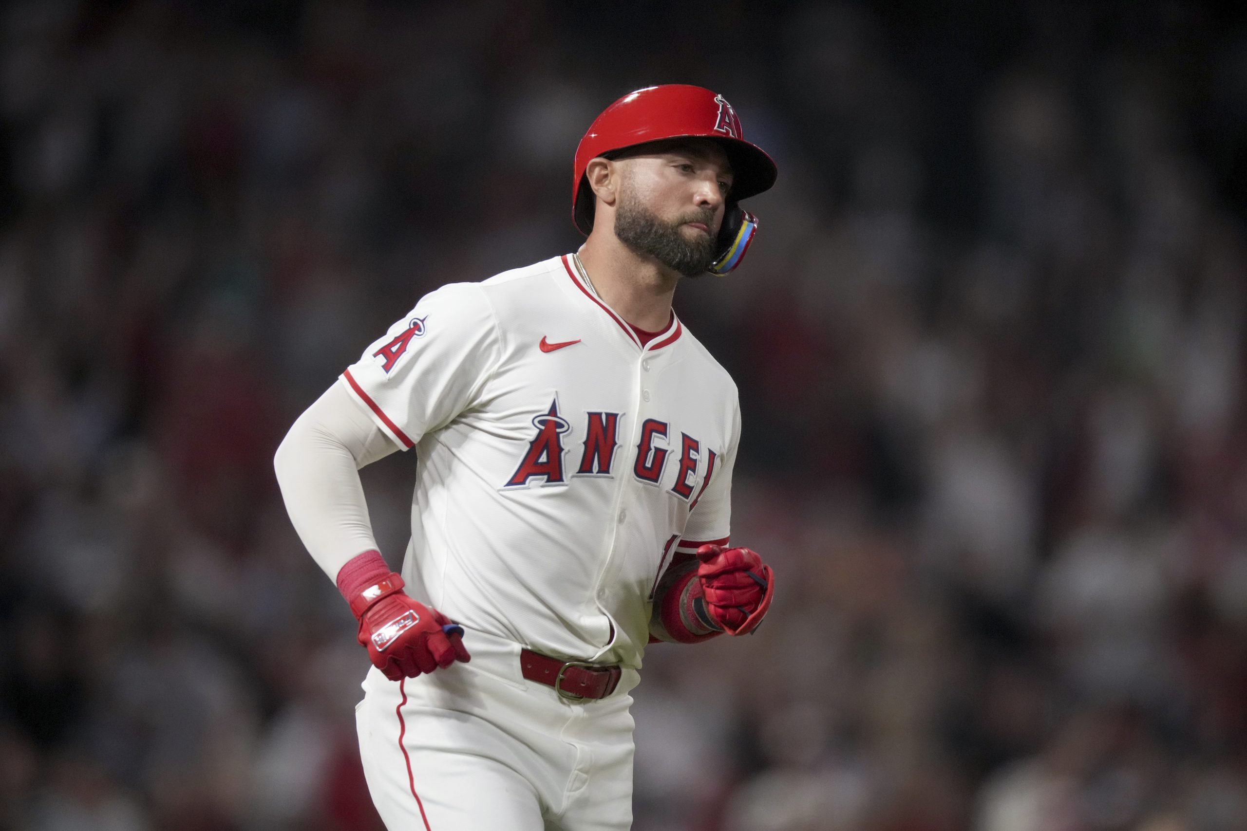 Los Angeles Angels’ Kevin Pillar heads to first on a...