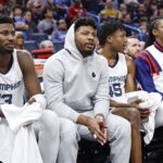 Mar 10, 2024; Oklahoma City, Oklahoma, USA; Memphis Grizzlies forward Jaren Jackson Jr. (13), guard Marcus Smart (36), forward GG Jackson (45) and guard Ja Morant (12) watch their team play against the Oklahoma City Thunder from the bench during the second half at Paycom Center. Mandatory Credit: Alonzo Adams-USA TODAY Sports