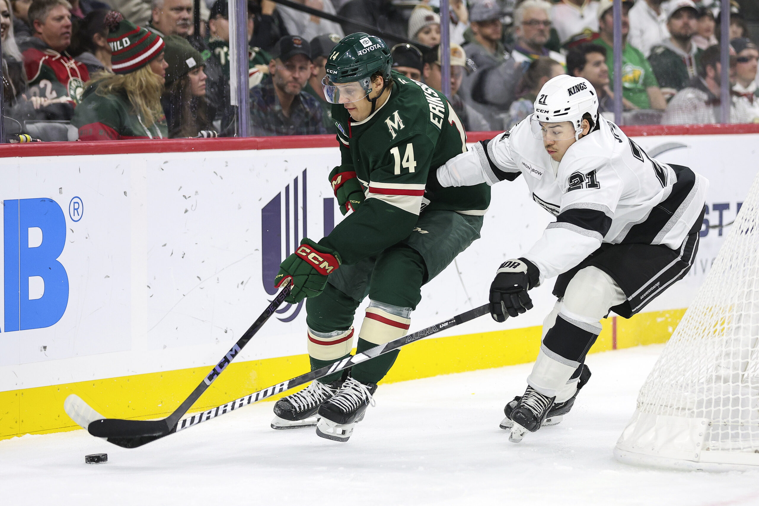 Minnesota Wild center Joel Eriksson Ek, left, and Kings defenseman...